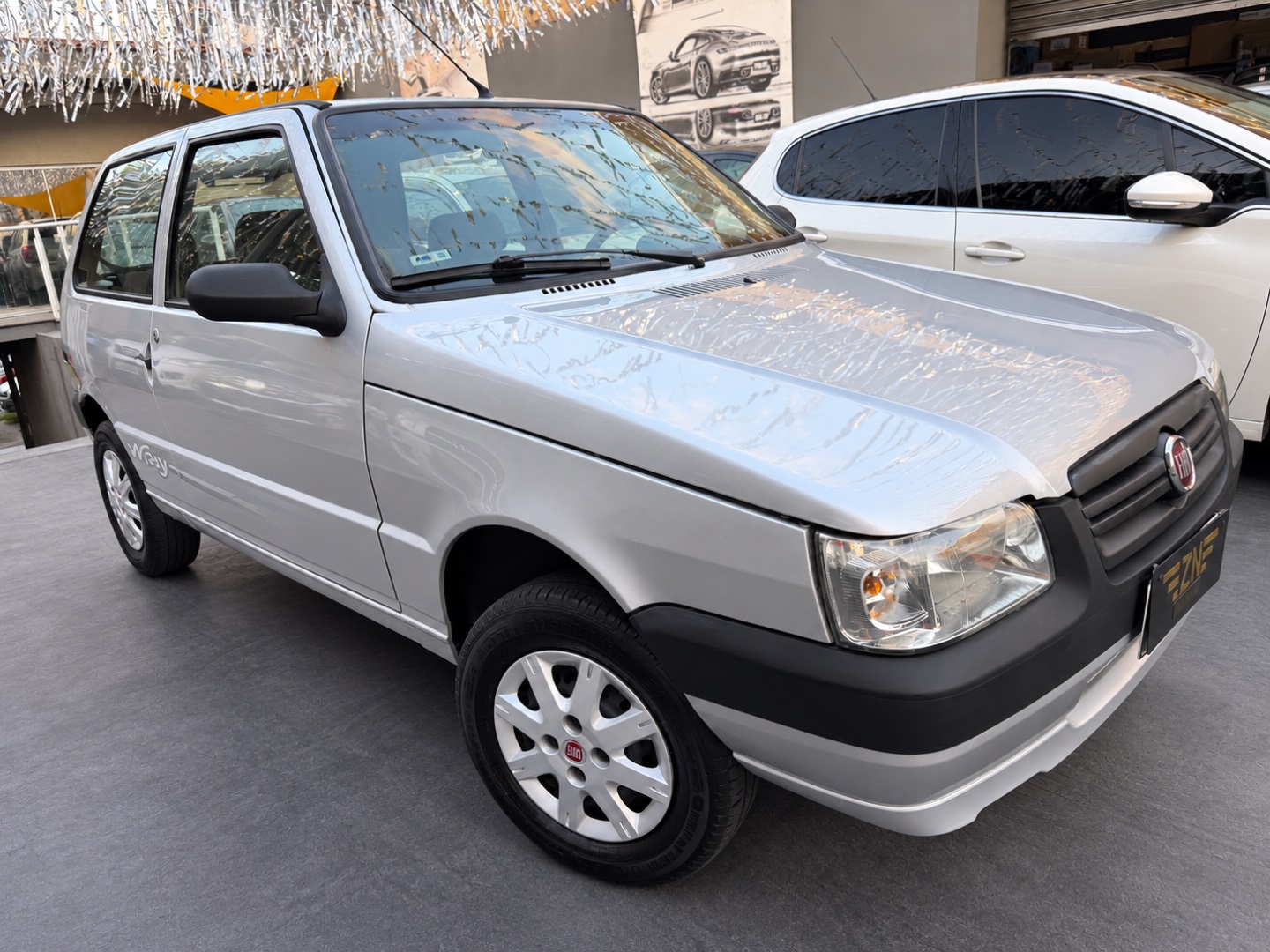 Fiat Uno 1.0 MPI Mille Fire Economy 8V Flex 2P Manual - foto 2