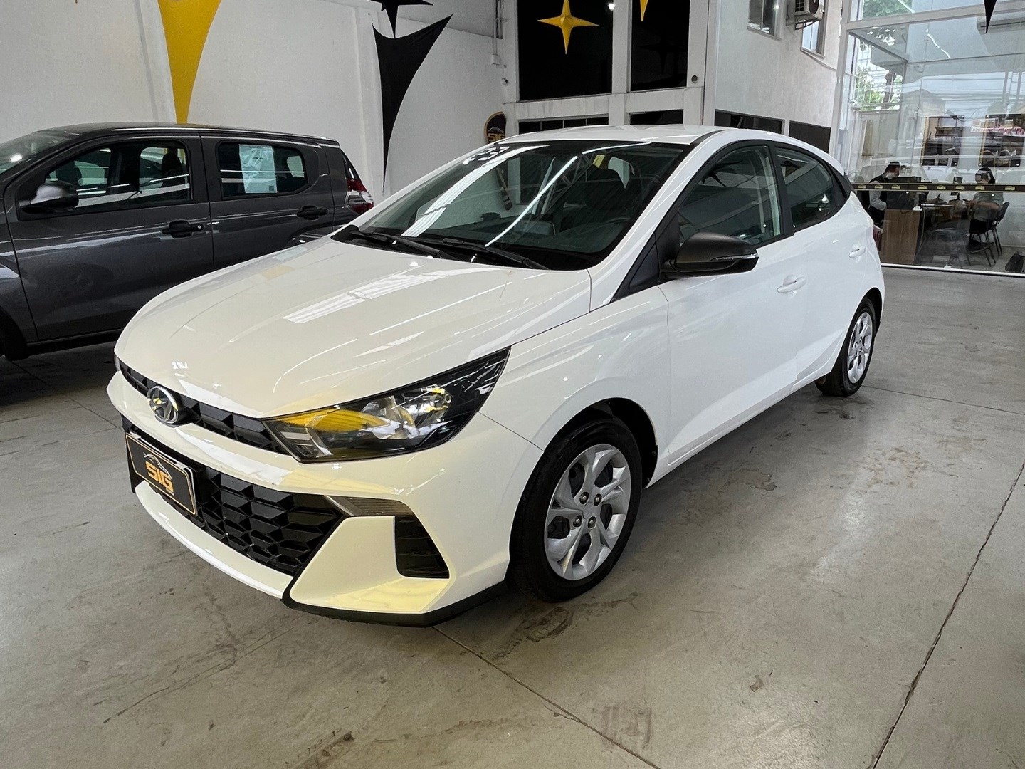 HYUNDAI HB20 1.0 12V FLEX COMFORT MANUAL 2023 Branco - Miniatura 4 - SIG Multimarcas