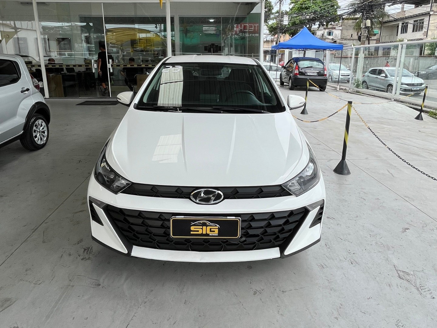 HYUNDAI HB20 1.0 12V FLEX COMFORT MANUAL 2023 Branco - Miniatura 2 - SIG Multimarcas