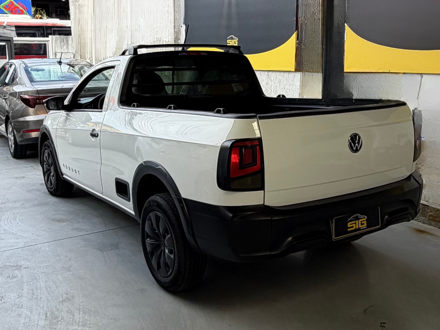 VOLKSWAGEN SAVEIRO 1.6 MSI ROBUST CS 16V FLEX 2P MANUAL 2024 Branco seminovo à venda em Duque de Caxias - Miniatura Interior - SIG Multimarcas