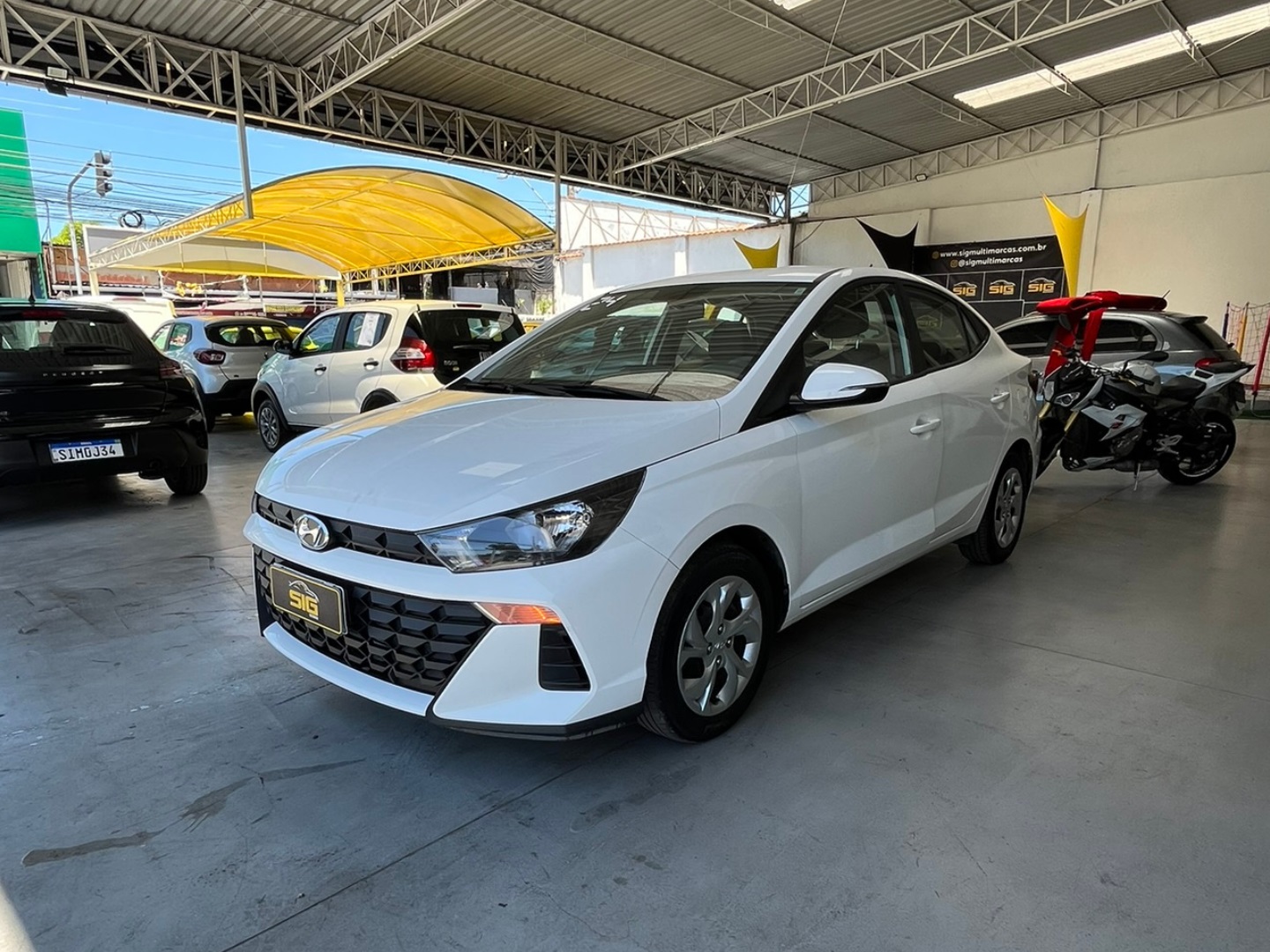 HYUNDAI HB20S 1.0 12V FLEX COMFORT MANUAL 2024 Branco - Miniatura 4 - SIG Multimarcas