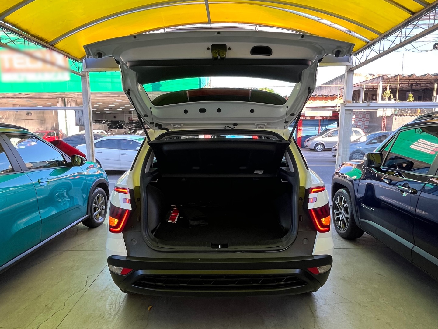 HYUNDAI CRETA 1.0 TGDI FLEX COMFORT AUTOMÁTICO 2024 Branco - Miniatura 6 - SIG Multimarcas