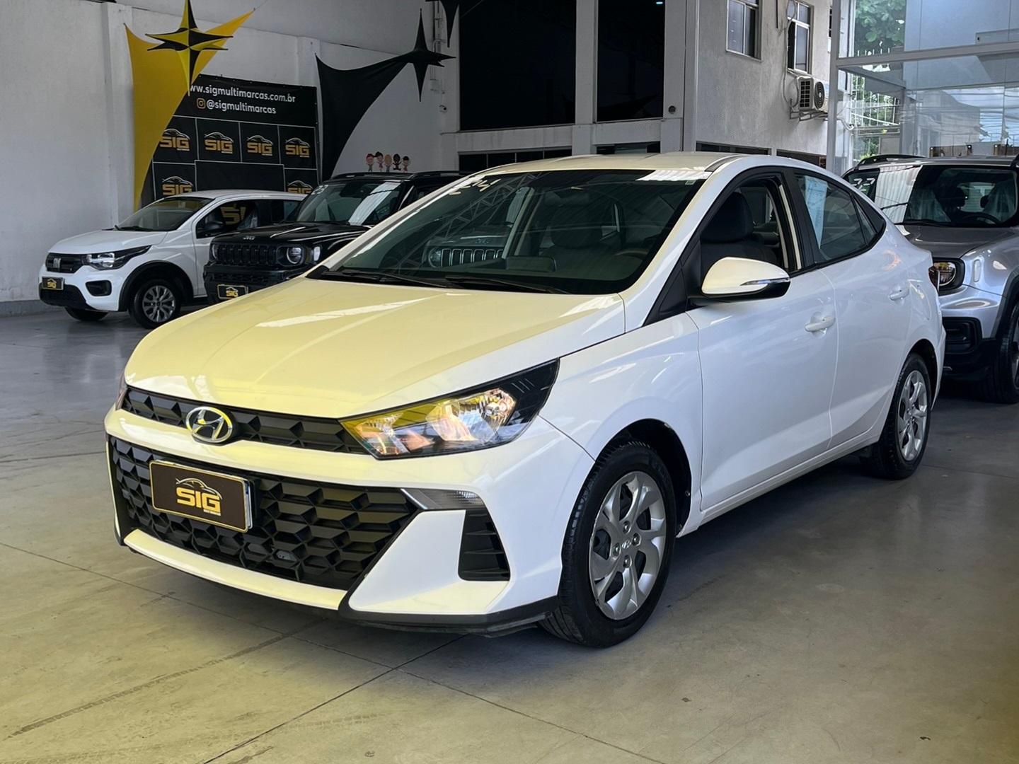 HYUNDAI HB20S 1.0 12V FLEX COMFORT PLUS MANUAL 2024 Branco - Miniatura 3 - SIG Multimarcas