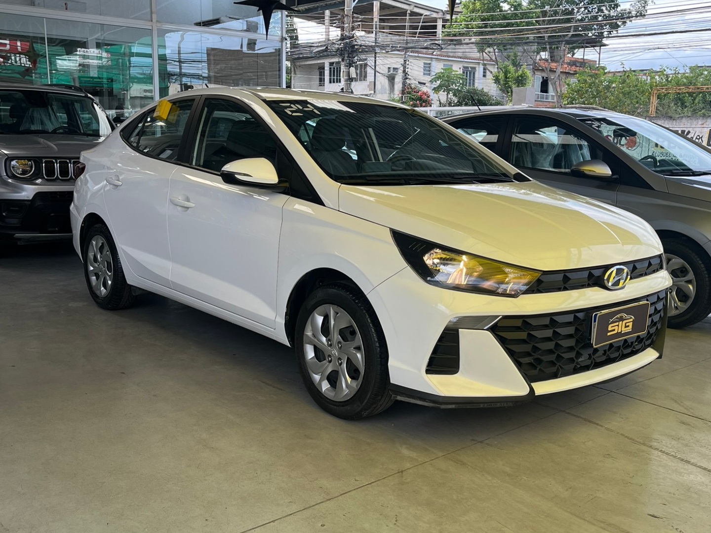 HYUNDAI HB20S 1.0 12V FLEX COMFORT PLUS MANUAL 2024 Branco - Miniatura 4 - SIG Multimarcas