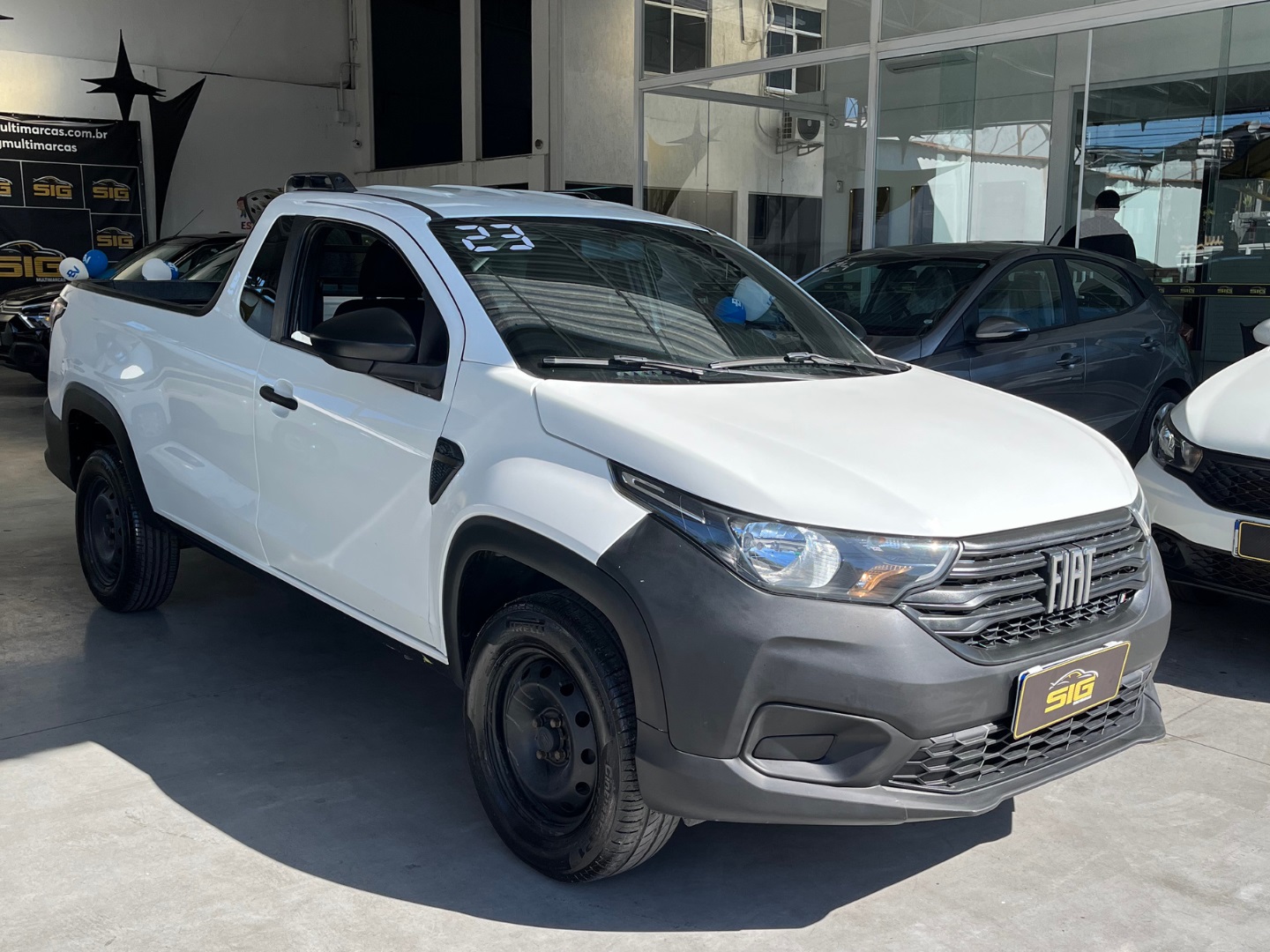 FIAT STRADA 1.4 FIRE FLEX ENDURANCE CS MANUAL 2023 Branco seminovo à venda em Duque de Caxias - Miniatura Traseira - SIG Multimarcas