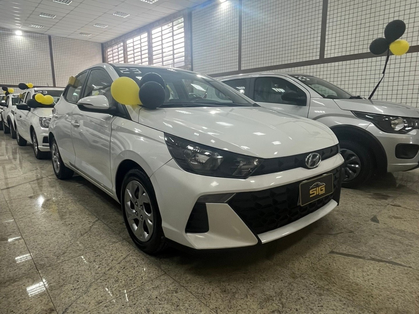 HYUNDAI HB20 1.0 12V FLEX COMFORT MANUAL 2023 Branco - Miniatura 4 - SIG Multimarcas