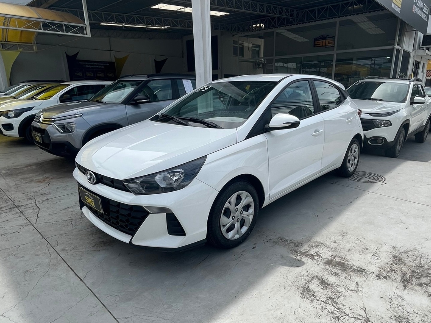 HYUNDAI HB20 1.0 12V FLEX COMFORT MANUAL 2023 Branco - Miniatura 4 - SIG Multimarcas