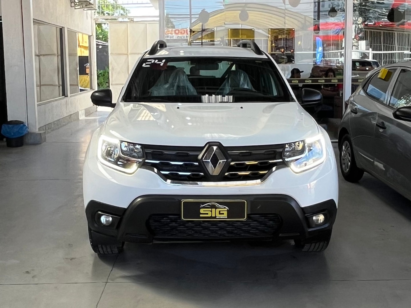 RENAULT DUSTER 1.6 16V SCE FLEX INTENSE X-TRONIC 2024 Branco - Miniatura 2 - SIG Multimarcas