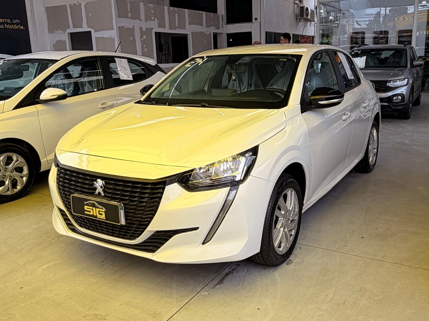 PEUGEOT 208 1.6 16V FLEX ACTIVE AT6 2024 Branco seminovo à venda em Duque de Caxias - Miniatura Traseira - SIG Multimarcas