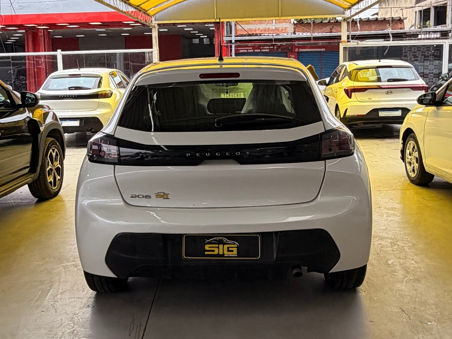 PEUGEOT 208 1.6 16V FLEX ACTIVE AT6 2024 Branco seminovo à venda em Duque de Caxias - Miniatura Interior - SIG Multimarcas