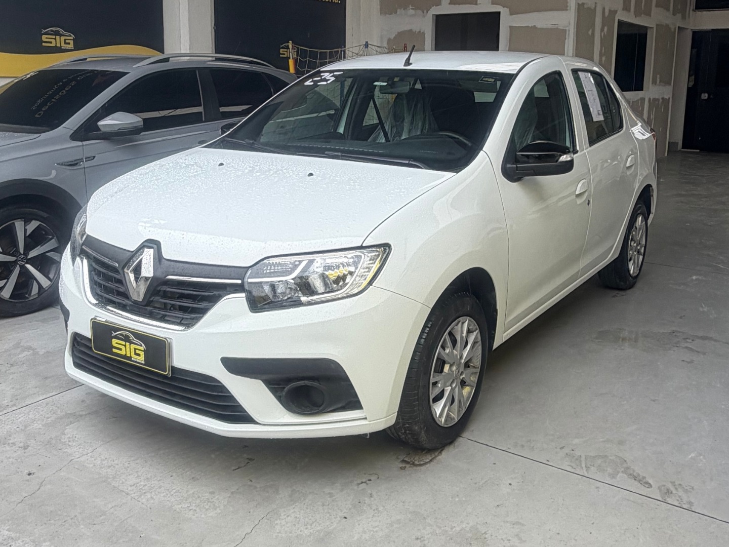RENAULT LOGAN 1.0 12V SCE FLEX ZEN MANUAL 2025 Branco seminovo à venda em Duque de Caxias - Miniatura Traseira - SIG Multimarcas