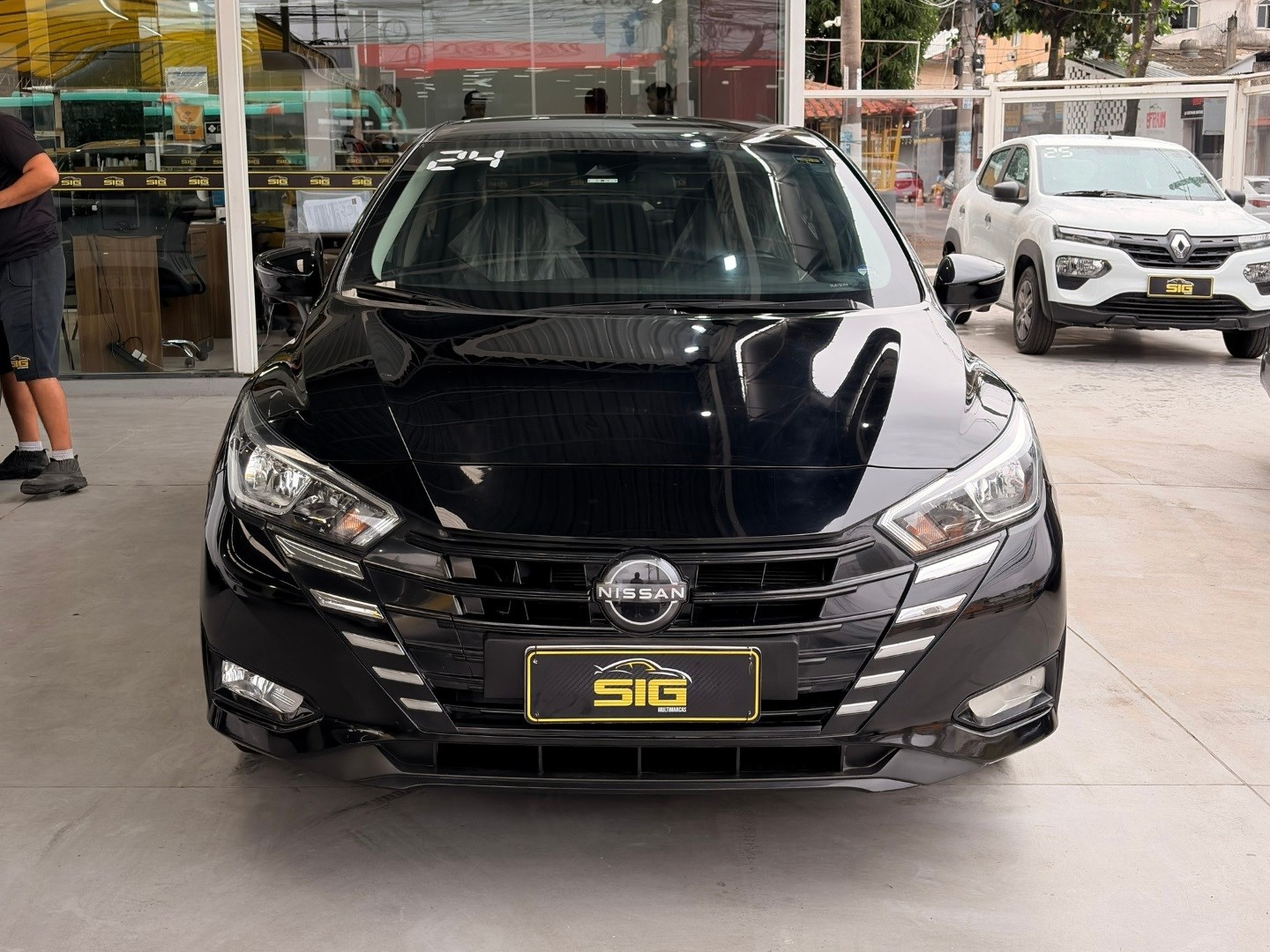 NISSAN VERSA 1.6 16V FLEX ADVANCE XTRONIC 2024 Preto seminovo à venda em Duque de Caxias - Miniatura Lateral - SIG Multimarcas