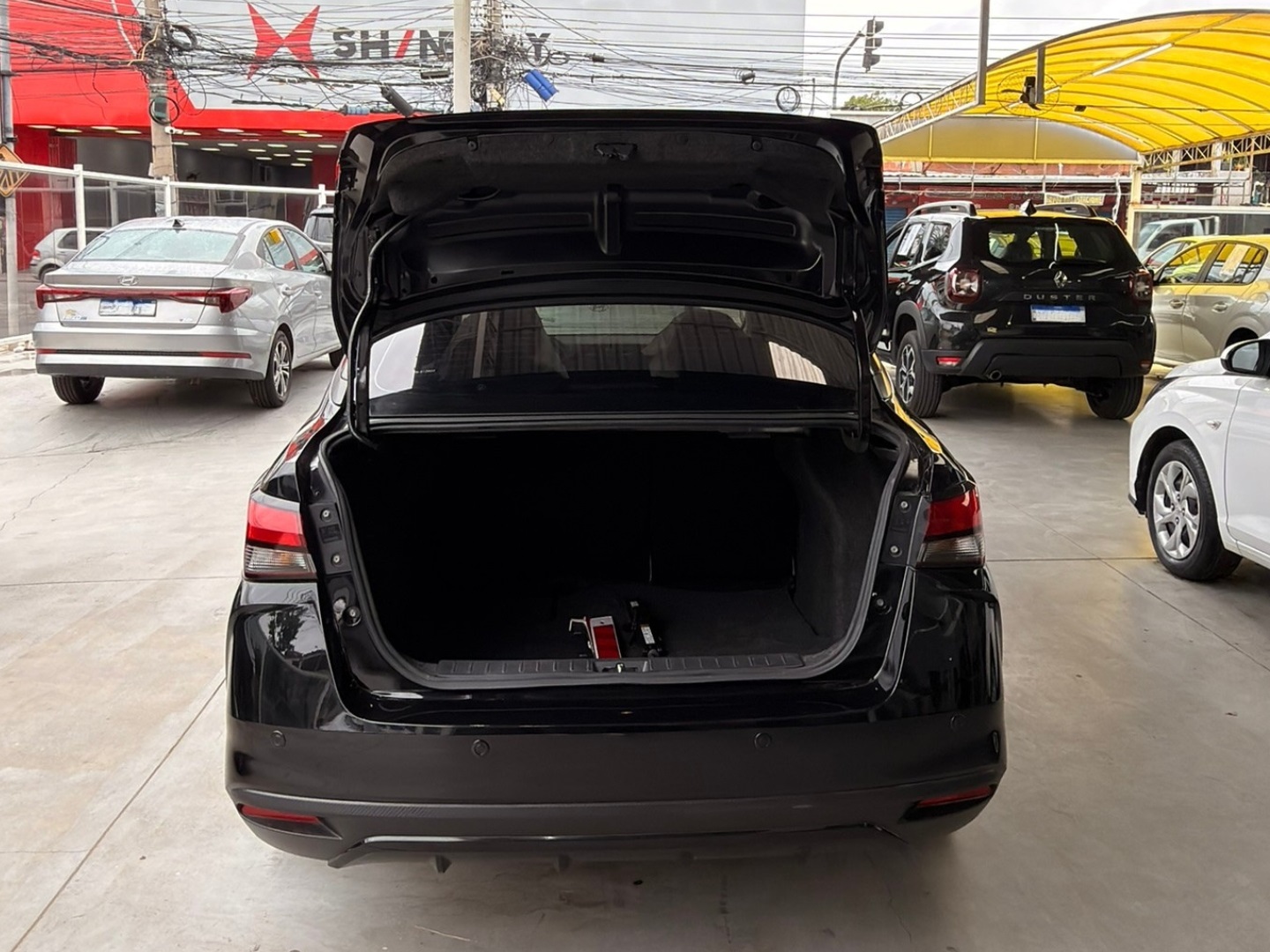 NISSAN VERSA 1.6 16V FLEX ADVANCE XTRONIC 2024 Preto seminovo à venda em Duque de Caxias - Miniatura Vista 8 - SIG Multimarcas