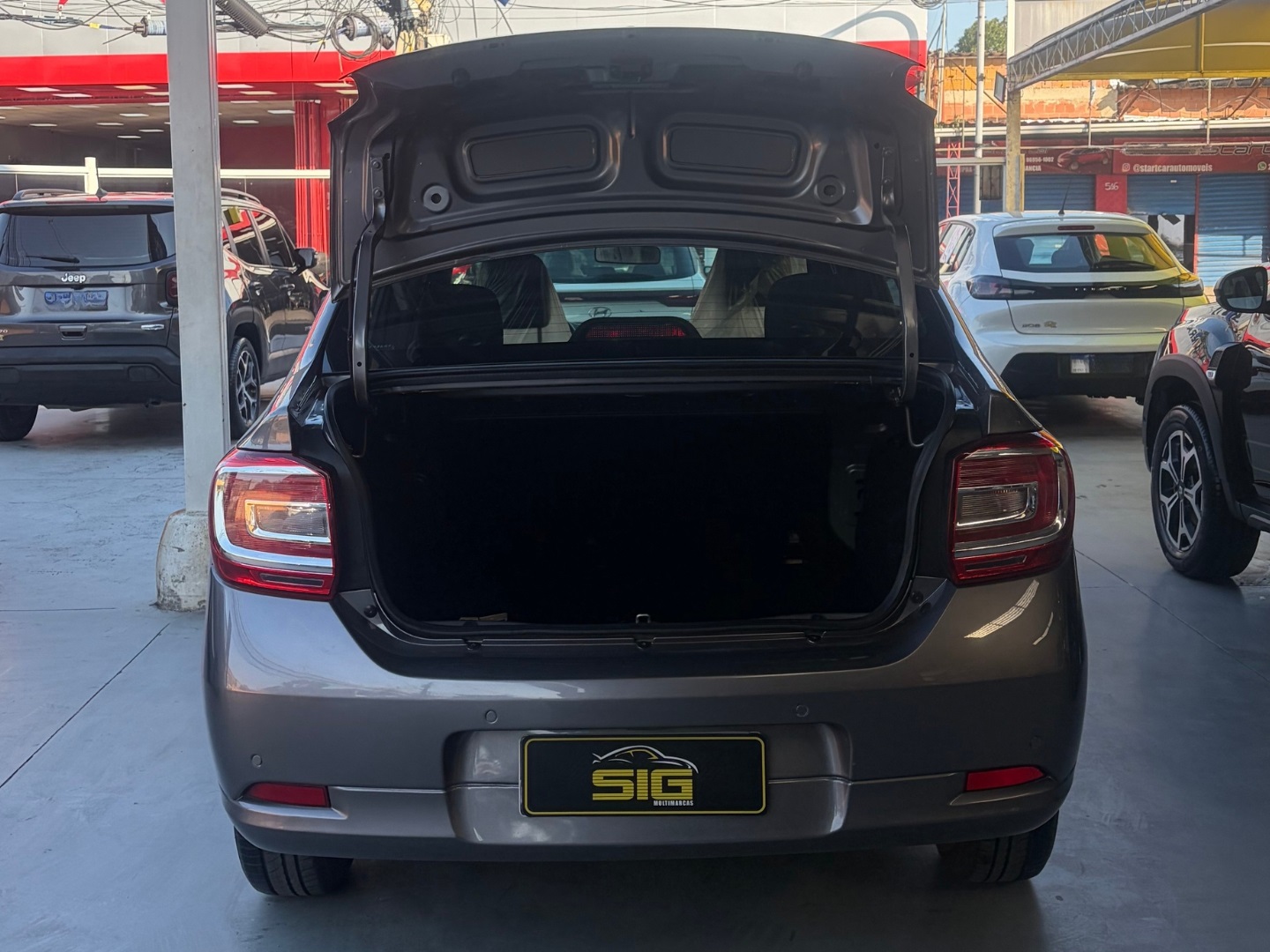 RENAULT LOGAN 1.0 12V SCE FLEX ZEN MANUAL 2025 Cinza seminovo à venda em Duque de Caxias - Miniatura Vista 7 - SIG Multimarcas