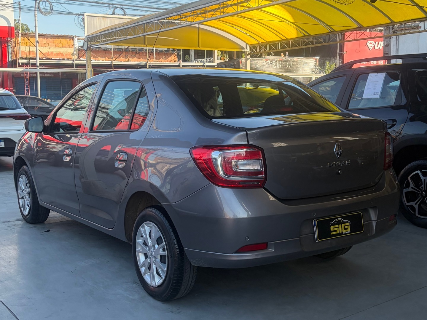 RENAULT LOGAN 1.0 12V SCE FLEX ZEN MANUAL 2025 Cinza seminovo à venda em Duque de Caxias - Miniatura Interior - SIG Multimarcas