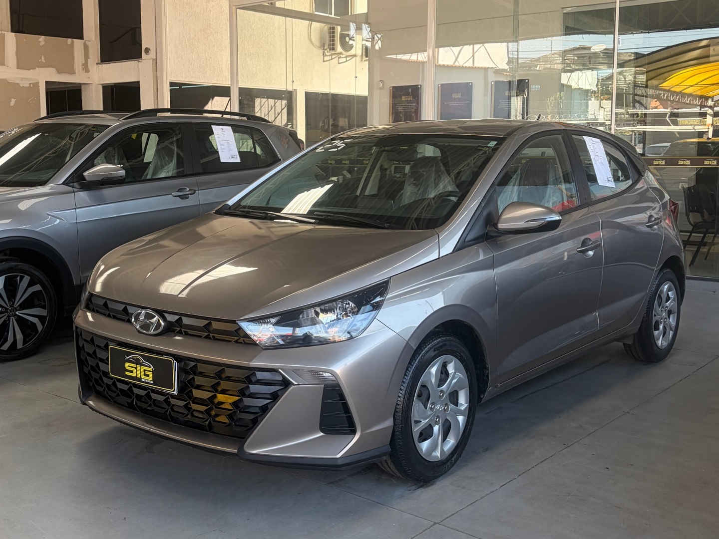 HYUNDAI HB20 1.0 12V FLEX COMFORT PLUS MANUAL 2025 Prata seminovo à venda em Duque de Caxias - Miniatura Lateral - SIG Multimarcas