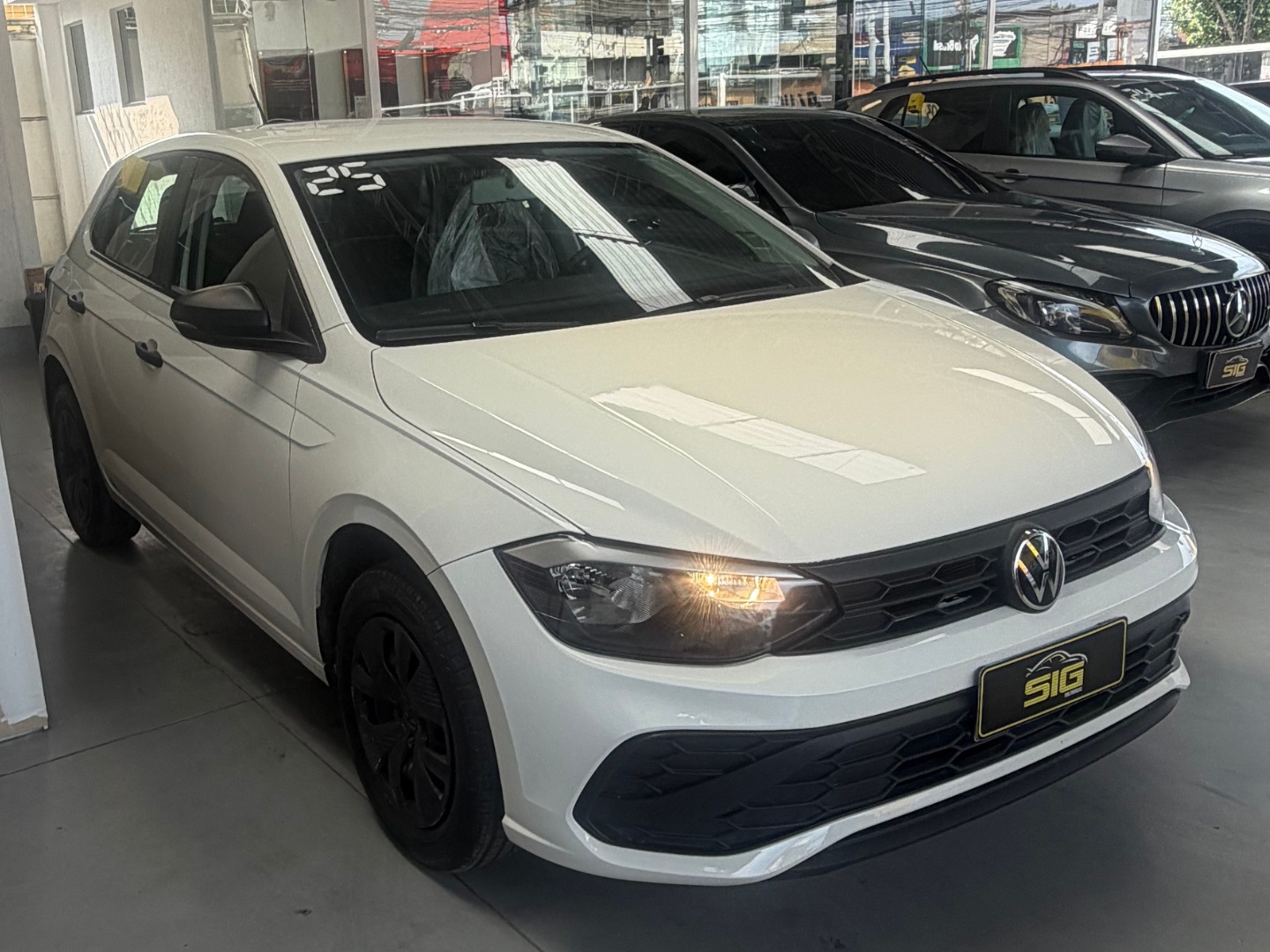 VOLKSWAGEN POLO 1.0 MPI TRACK MANUAL 2025 Branco seminovo à venda em Duque de Caxias - Miniatura Lateral - SIG Multimarcas