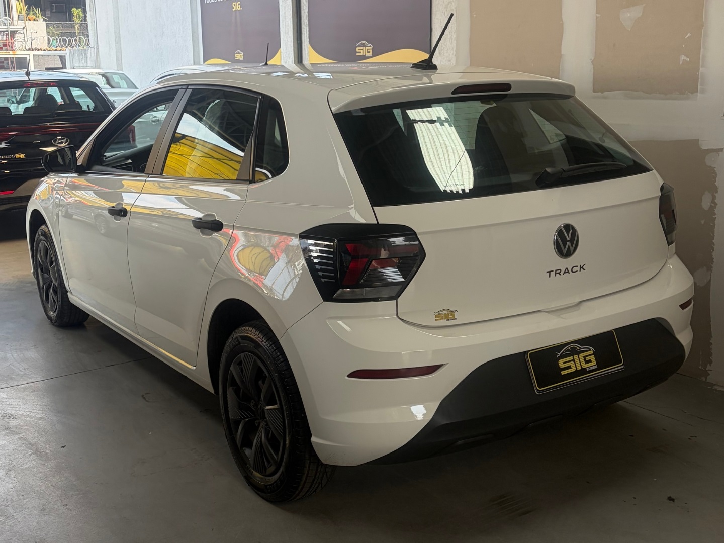 VOLKSWAGEN POLO 1.0 MPI TRACK MANUAL 2025 Branco seminovo à venda em Duque de Caxias - Miniatura Detalhe - SIG Multimarcas