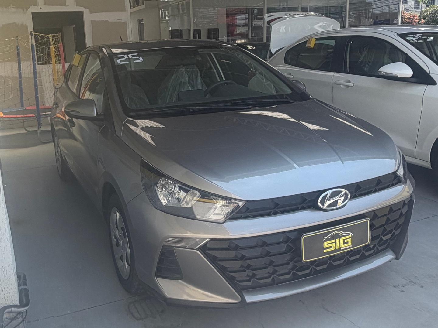 HYUNDAI HB20S 1.0 12V FLEX COMFORT PLUS MANUAL 2025 Prata seminovo à venda em Duque de Caxias - Miniatura Lateral - SIG Multimarcas