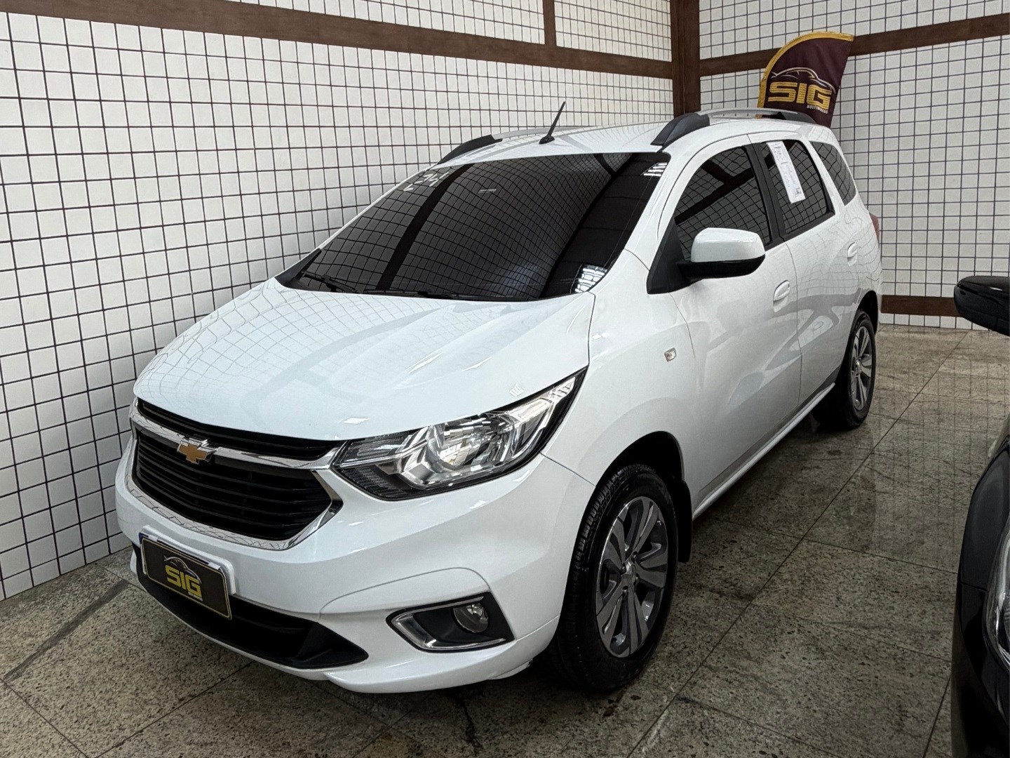 CHEVROLET SPIN SPIN PREMIER 7L 1.8 8V ECONOFLEX 4P C/AR - AUTOMÁTICO 2024 Branco seminovo à venda em Duque de Caxias - Miniatura Lateral - SIG Multimarcas