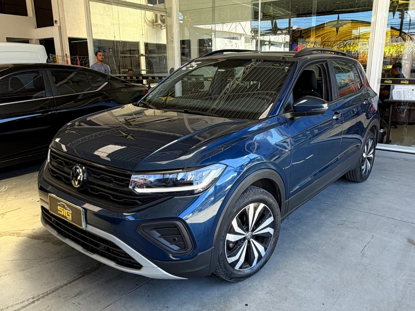 VOLKSWAGEN T-CROSS 1.0 200 TSI TOTAL FLEX AUTOMÁTICO 2025 Azul seminovo à venda em Duque de Caxias - Miniatura Lateral - SIG Multimarcas