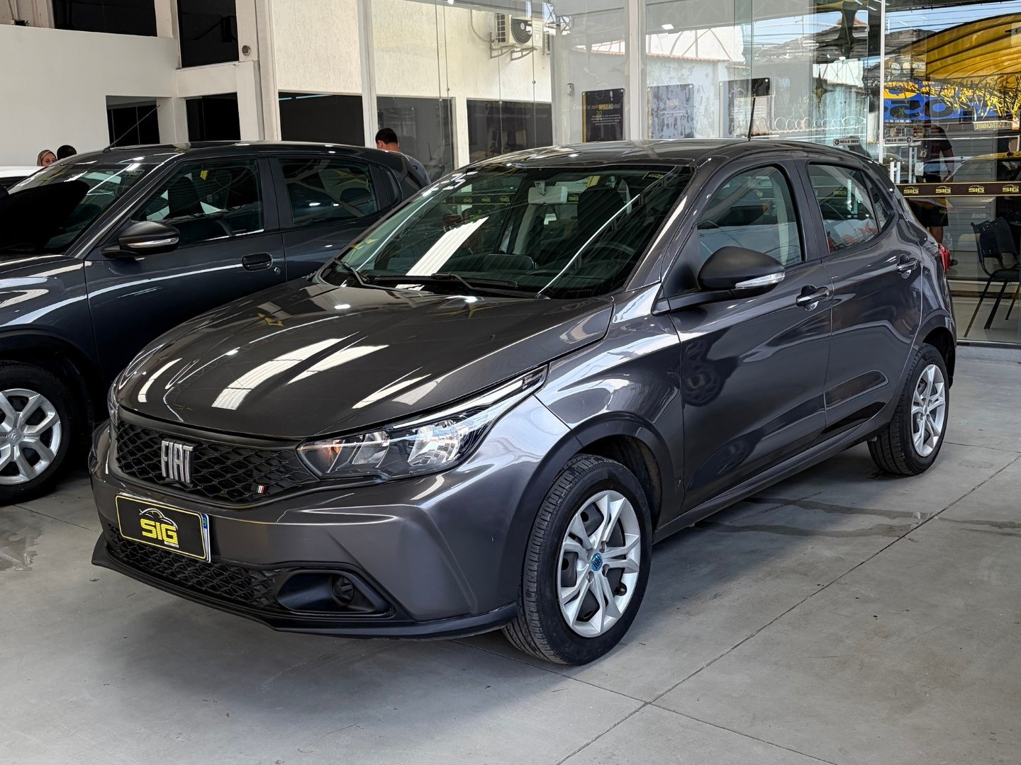 FIAT ARGO 1.0 FIREFLY FLEX DRIVE MANUAL 2025 Cinza seminovo à venda em Duque de Caxias - Miniatura Traseira - SIG Multimarcas