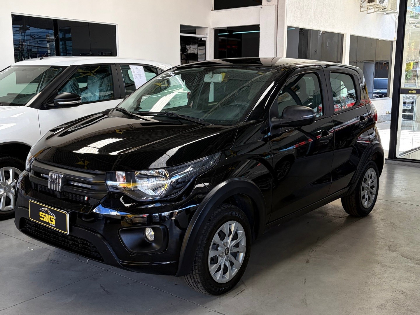 FIAT MOBI 1.0 FIREFLY FLEX LIKE. MANUAL 2025 Preto seminovo à venda em Duque de Caxias - Miniatura Interior - SIG Multimarcas