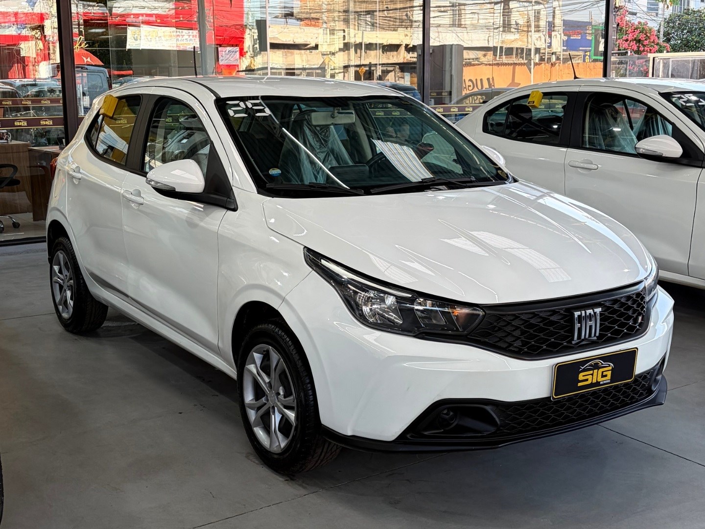 FIAT ARGO 1.0 FIREFLY FLEX DRIVE MANUAL 2025 Branco seminovo à venda em Duque de Caxias - Miniatura Traseira - SIG Multimarcas