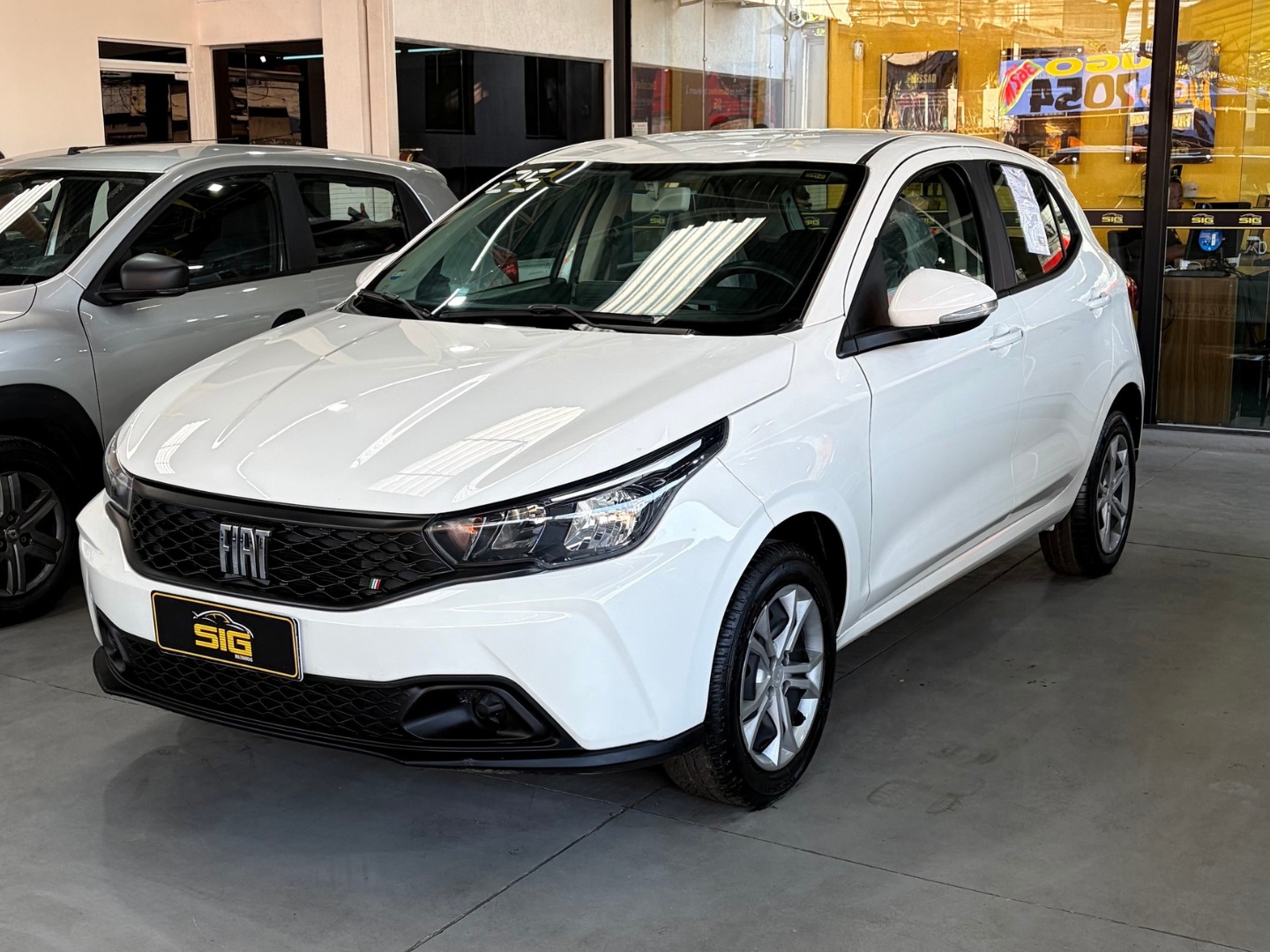 FIAT ARGO 1.0 FIREFLY FLEX DRIVE MANUAL 2025 Branco seminovo à venda em Duque de Caxias - Miniatura Interior - SIG Multimarcas