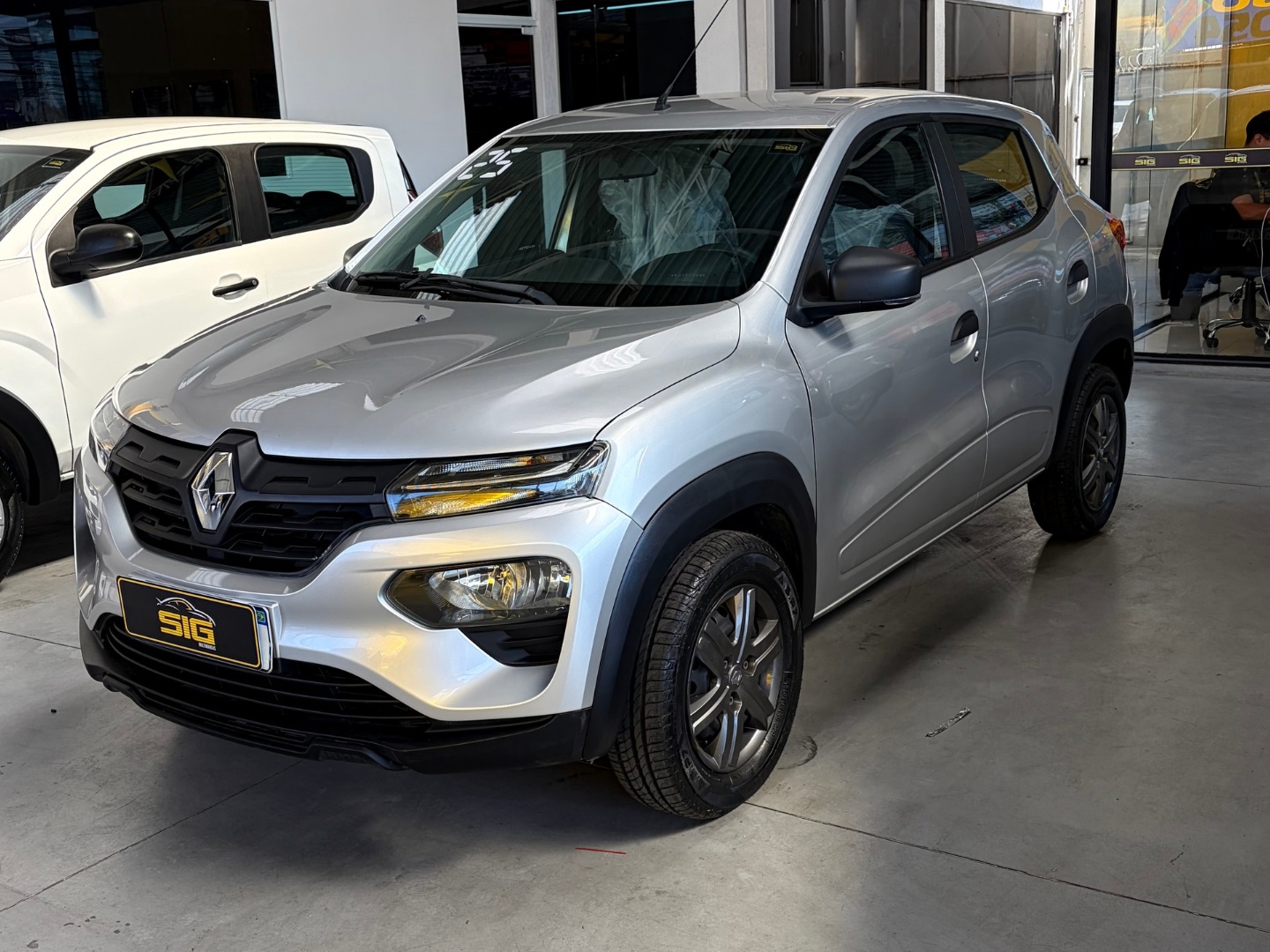RENAULT KWID 1.0 12V SCE FLEX ZEN MANUAL 2025 Prata seminovo à venda em Duque de Caxias - Miniatura Traseira - SIG Multimarcas