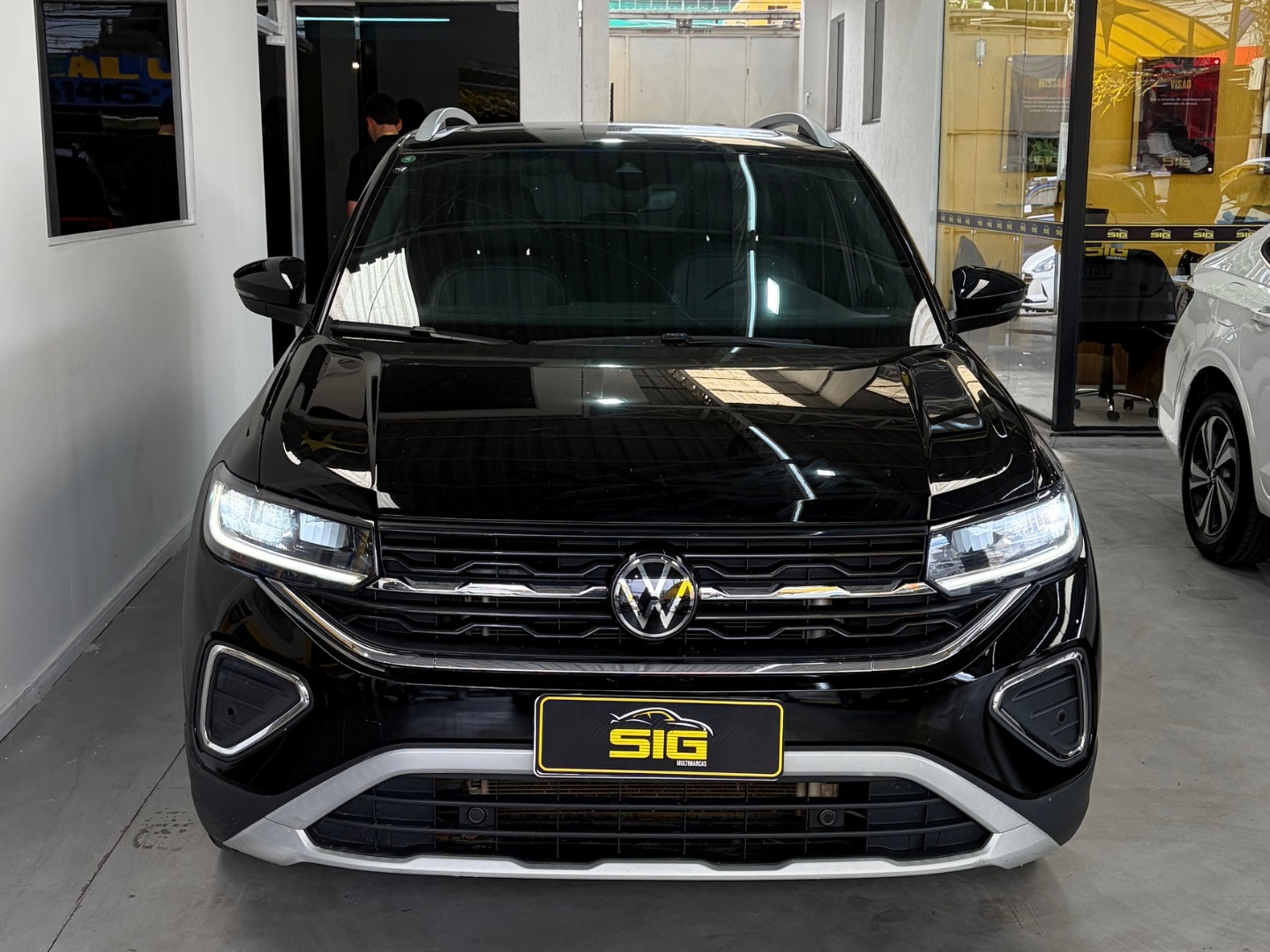 VOLKSWAGEN T-CROSS 1.4 250 TSI TOTAL FLEX HIGHLINE AUTOMÁTICO 2025 Preto seminovo à venda em Duque de Caxias - Miniatura Lateral - SIG Multimarcas
