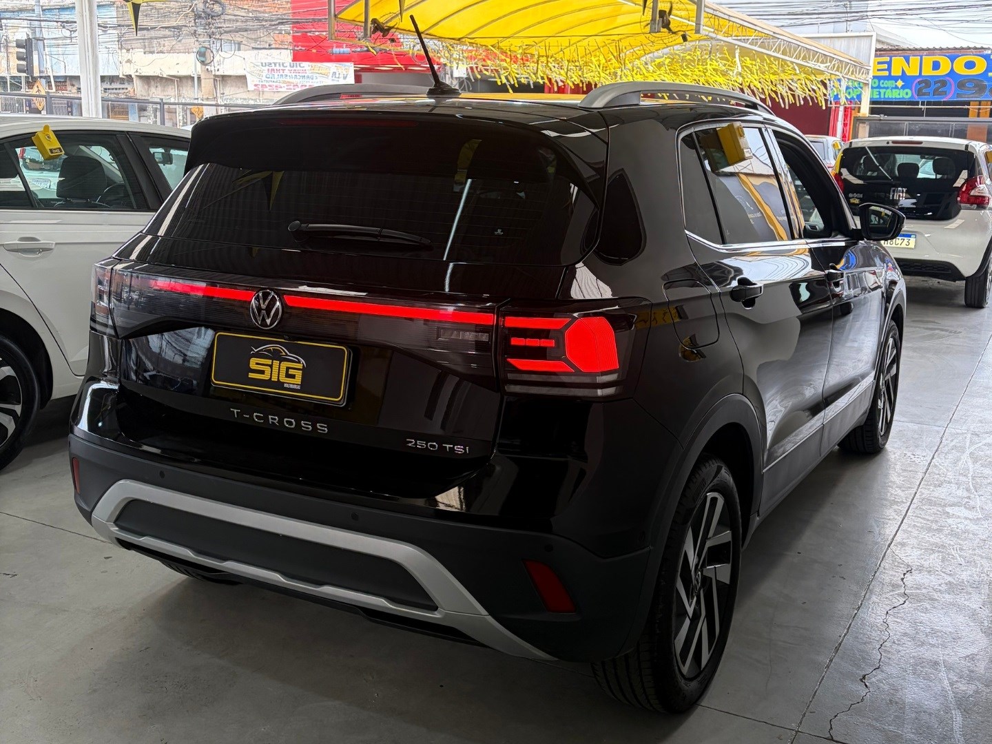 VOLKSWAGEN T-CROSS 1.4 250 TSI TOTAL FLEX HIGHLINE AUTOMÁTICO 2025 Preto seminovo à venda em Duque de Caxias - Miniatura Vista 6 - SIG Multimarcas