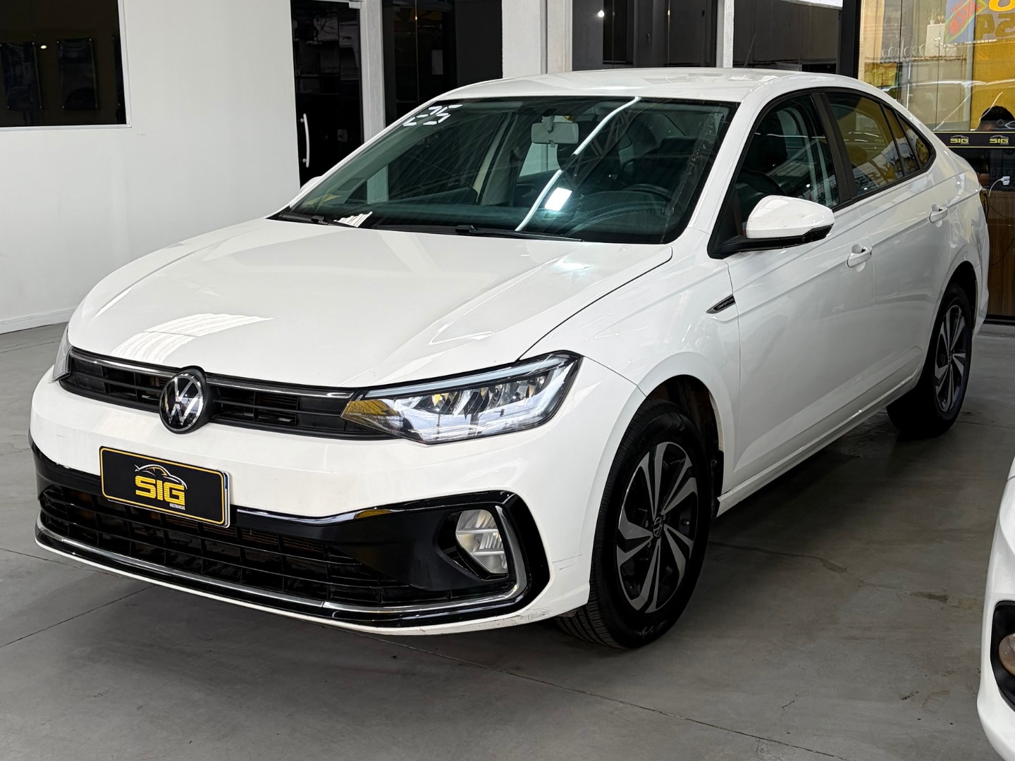 VOLKSWAGEN VIRTUS 1.0 200 TSI COMFORTLINE AUTOMÁTICO 2025 Branco seminovo à venda em Duque de Caxias - Miniatura Traseira - SIG Multimarcas