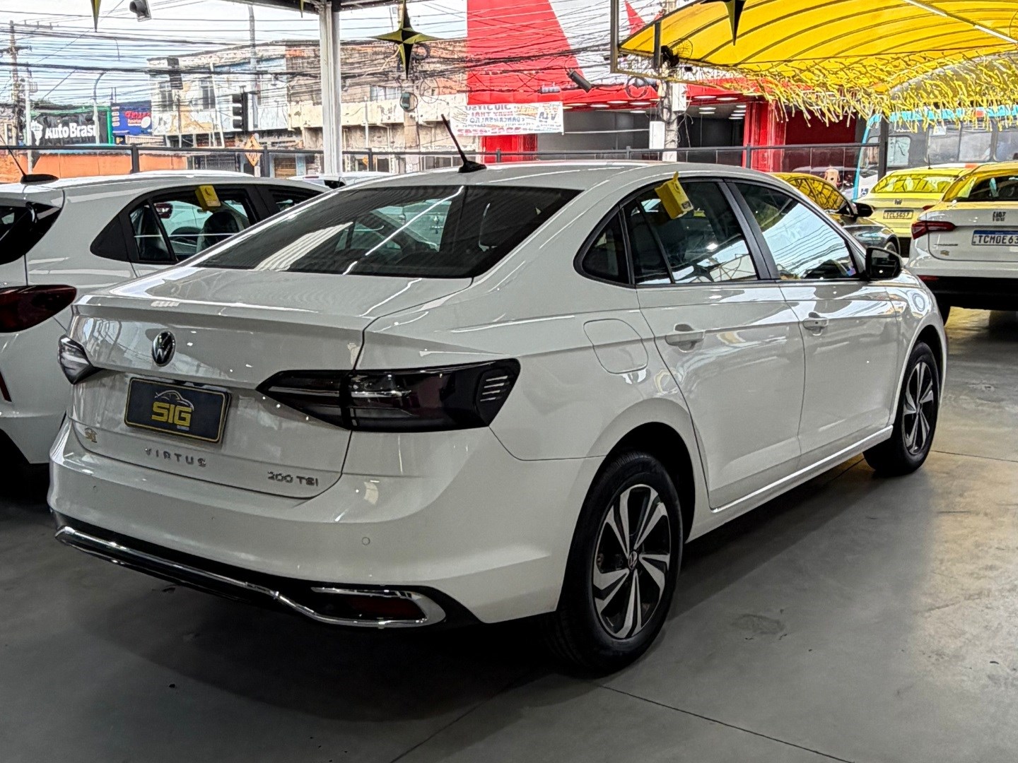 VOLKSWAGEN VIRTUS 1.0 200 TSI COMFORTLINE AUTOMÁTICO 2025 Branco seminovo à venda em Duque de Caxias - Miniatura Detalhe - SIG Multimarcas
