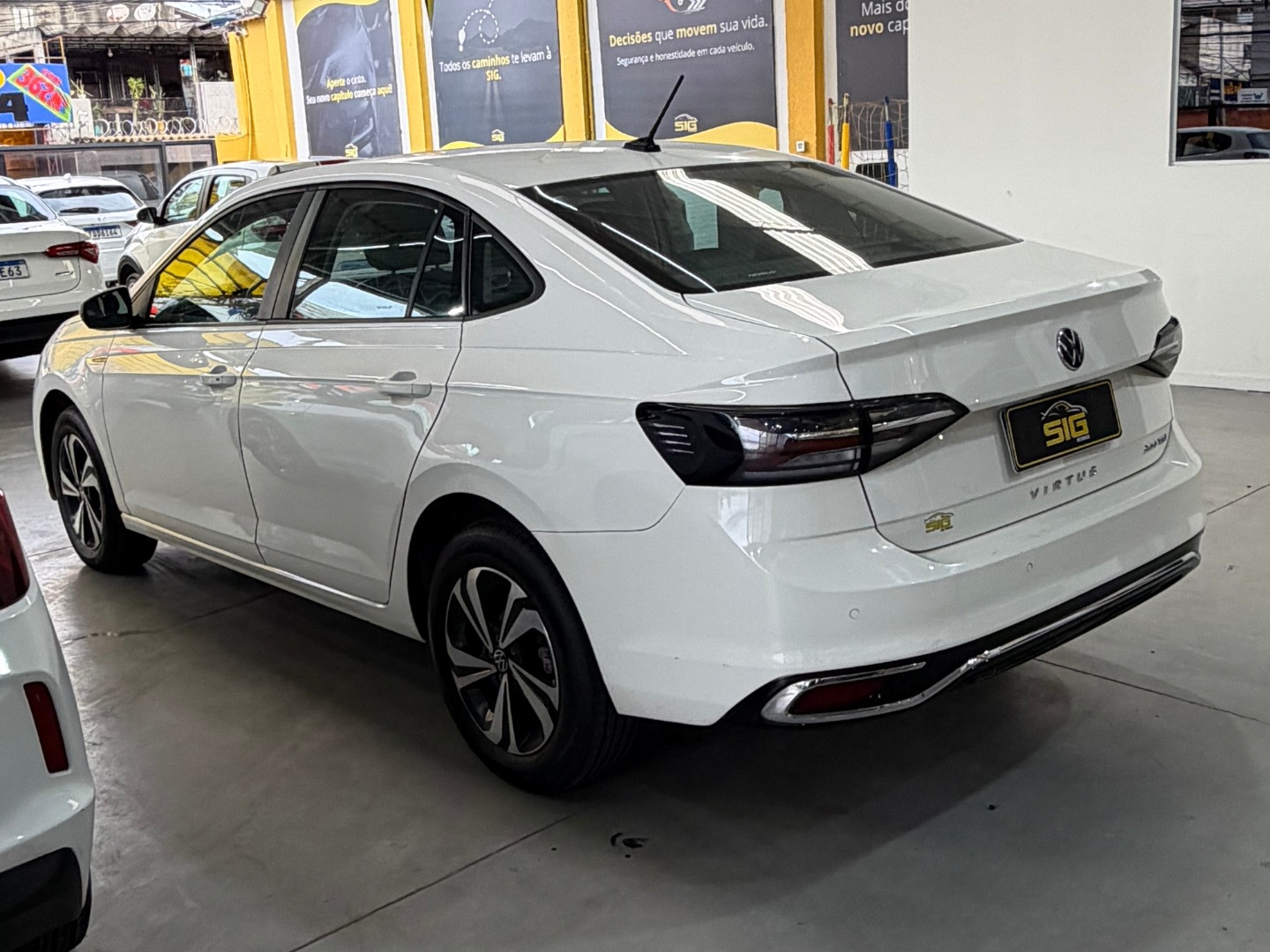 VOLKSWAGEN VIRTUS 1.0 200 TSI COMFORTLINE AUTOMÁTICO 2025 Branco seminovo à venda em Duque de Caxias - Miniatura Vista 6 - SIG Multimarcas