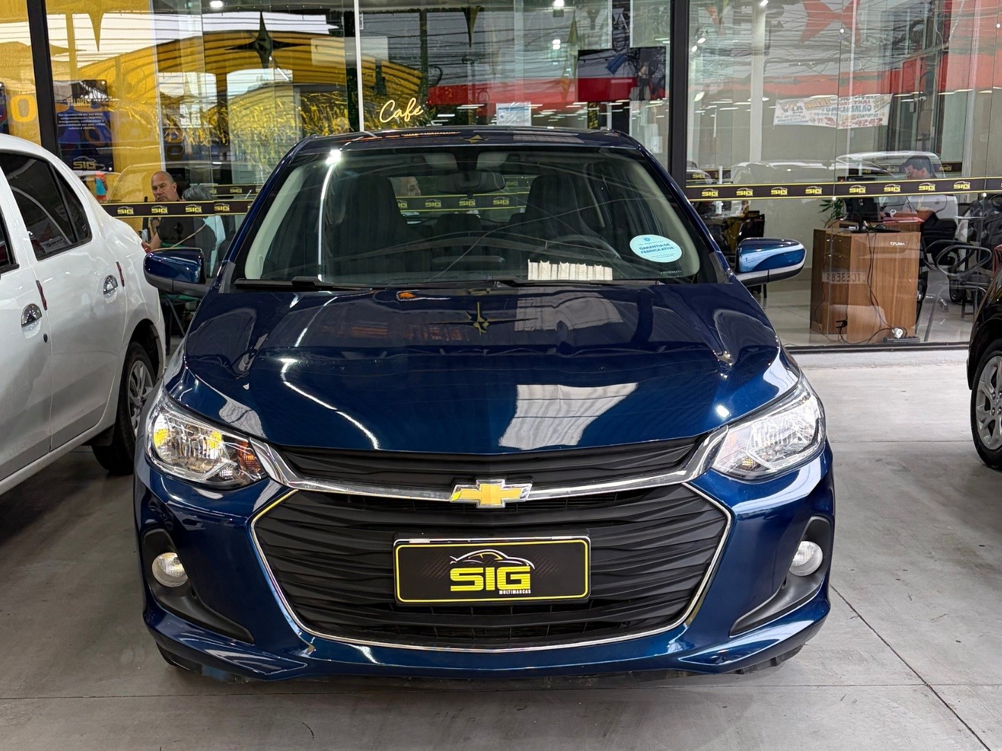 CHEVROLET ONIX 1.0 FLEX LT MANUAL 2025 Azul seminovo à venda em Duque de Caxias - Frente - SIG Multimarcas