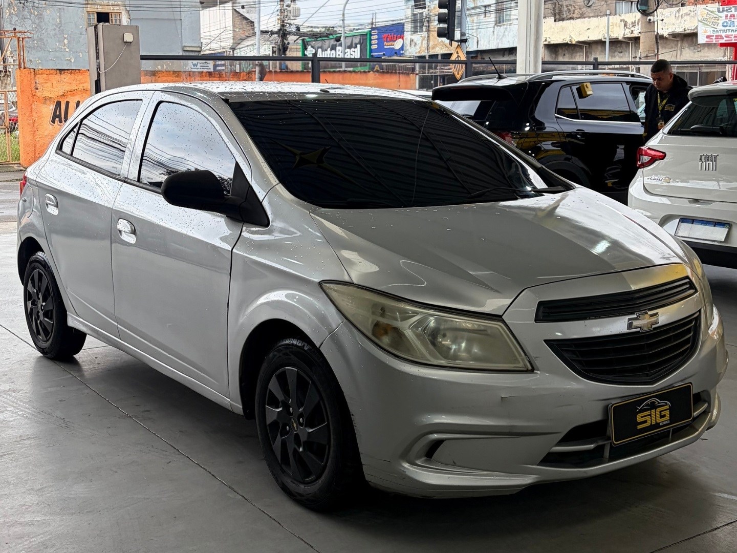 CHEVROLET ONIX 1.0 MPFI JOY 8V FLEX 4P MANUAL 2017 Prata seminovo à venda em Duque de Caxias - Miniatura Lateral - SIG Multimarcas