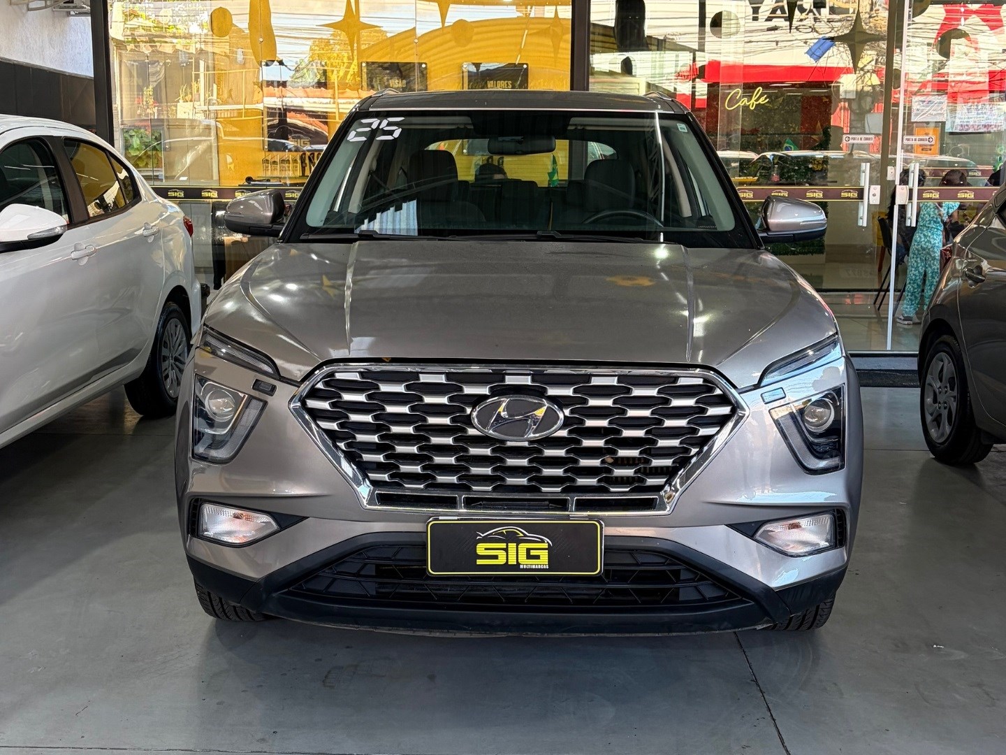 HYUNDAI CRETA 1.0 TGDI FLEX COMFORT PLUS AUTOMÁTICO 2025 Prata seminovo à venda em Duque de Caxias - Miniatura Lateral - SIG Multimarcas