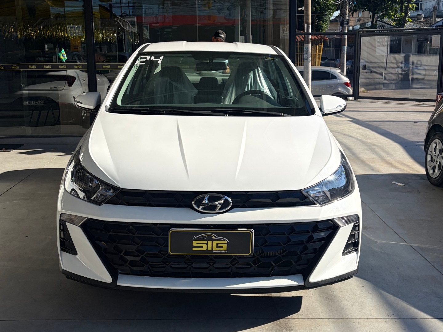 HYUNDAI HB20S 1.0 TGDI FLEX COMFORT AUTOMÁTICO 2024 Branco seminovo à venda em Duque de Caxias - Miniatura Lateral - SIG Multimarcas