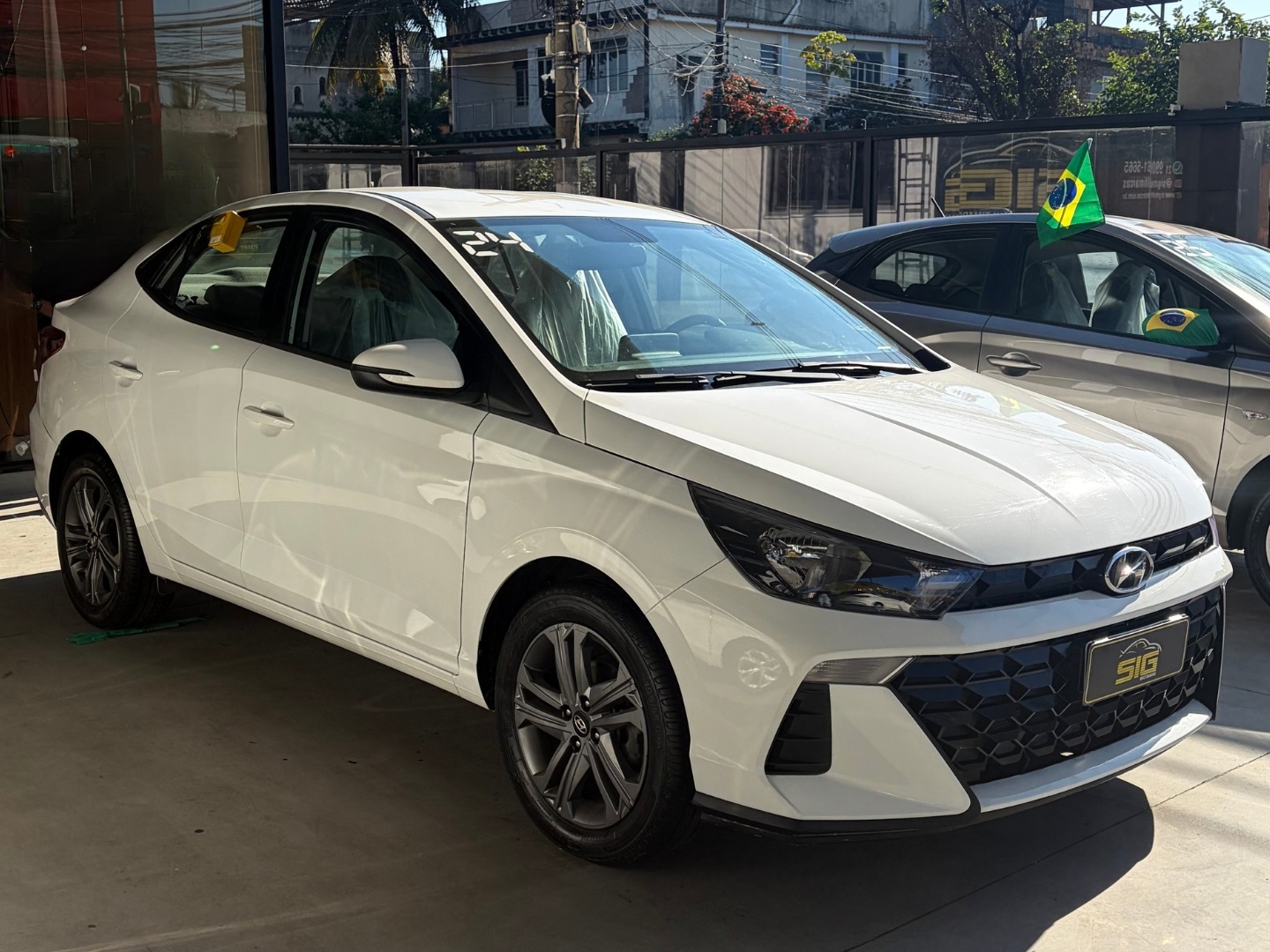 HYUNDAI HB20S 1.0 TGDI FLEX COMFORT AUTOMÁTICO 2024 Branco seminovo à venda em Duque de Caxias - Miniatura Traseira - SIG Multimarcas