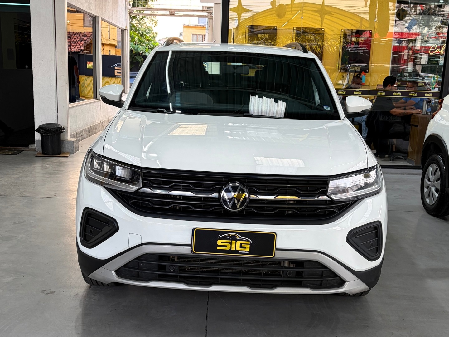 VOLKSWAGEN T-CROSS 1.0 200 TSI TOTAL FLEX COMFORTLINE AUTOMÁTICO 2025 Branco seminovo à venda em Duque de Caxias - Frente - SIG Multimarcas