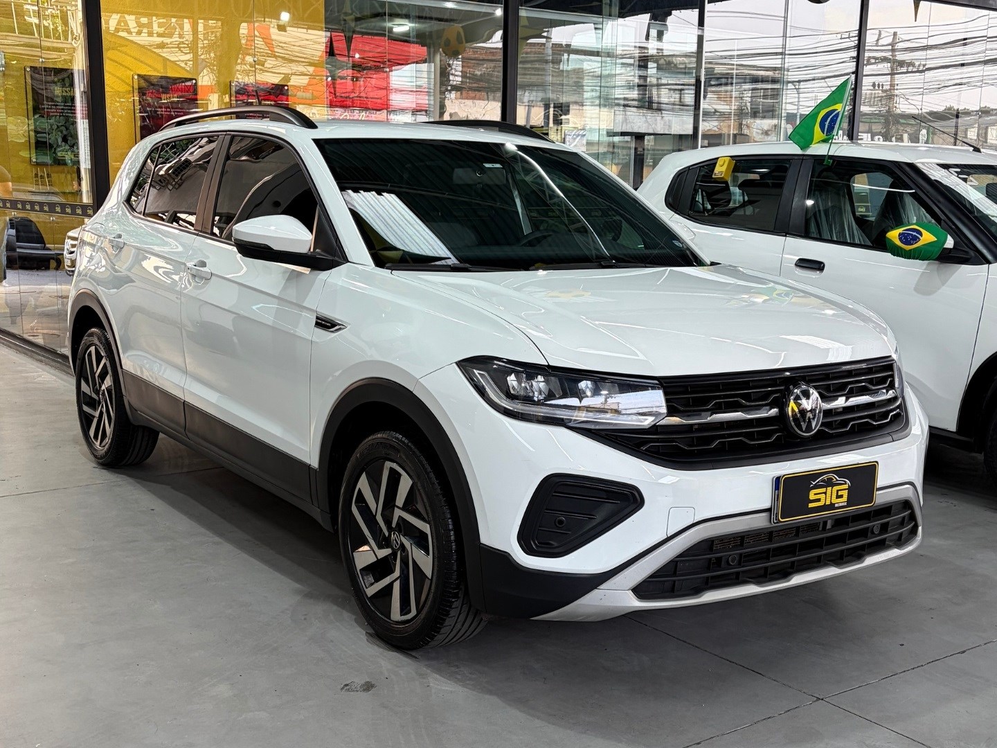 VOLKSWAGEN T-CROSS 1.0 200 TSI TOTAL FLEX COMFORTLINE AUTOMÁTICO 2025 Branco seminovo à venda em Duque de Caxias - Miniatura Lateral - SIG Multimarcas