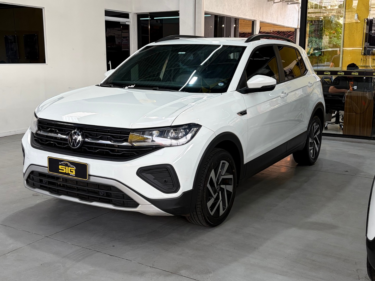 VOLKSWAGEN T-CROSS 1.0 200 TSI TOTAL FLEX COMFORTLINE AUTOMÁTICO 2025 Branco seminovo à venda em Duque de Caxias - Miniatura Traseira - SIG Multimarcas