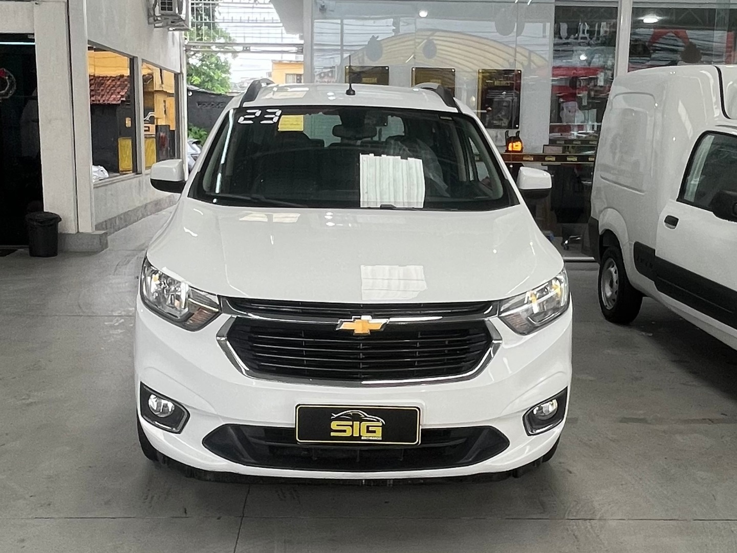 CHEVROLET SPIN 1.8 PREMIER 8V FLEX 4P AUTOMÁTICO 2023 Branco seminovo à venda em Duque de Caxias - Miniatura Lateral - SIG Multimarcas