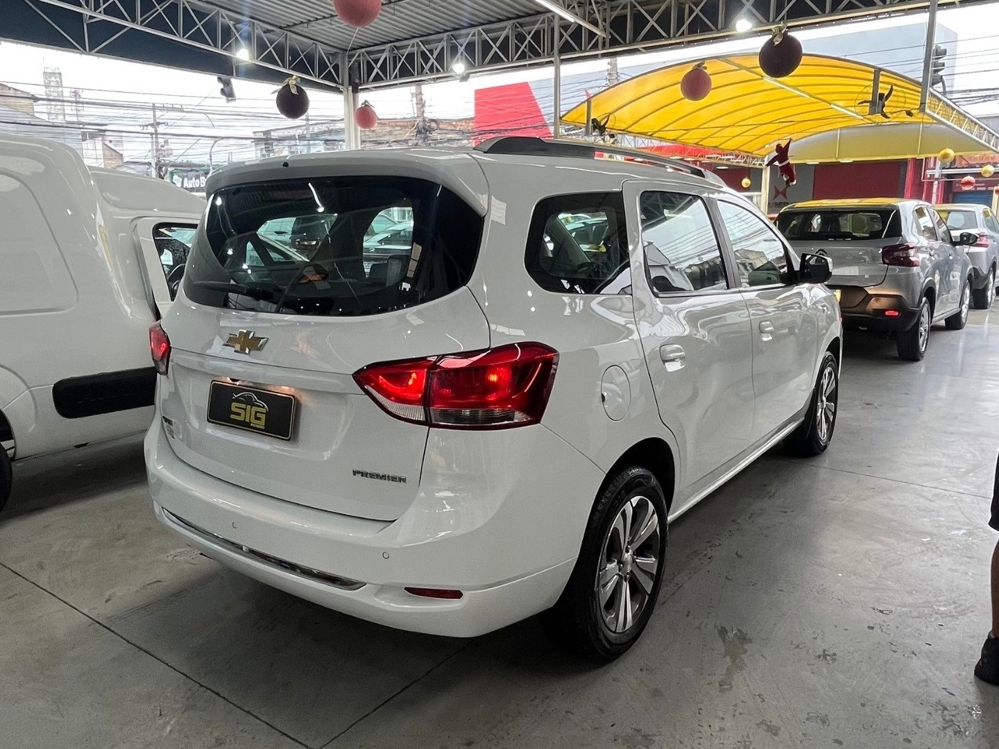 CHEVROLET SPIN 1.8 PREMIER 8V FLEX 4P AUTOMÁTICO 2023 Branco seminovo à venda em Duque de Caxias - Miniatura Vista 8 - SIG Multimarcas