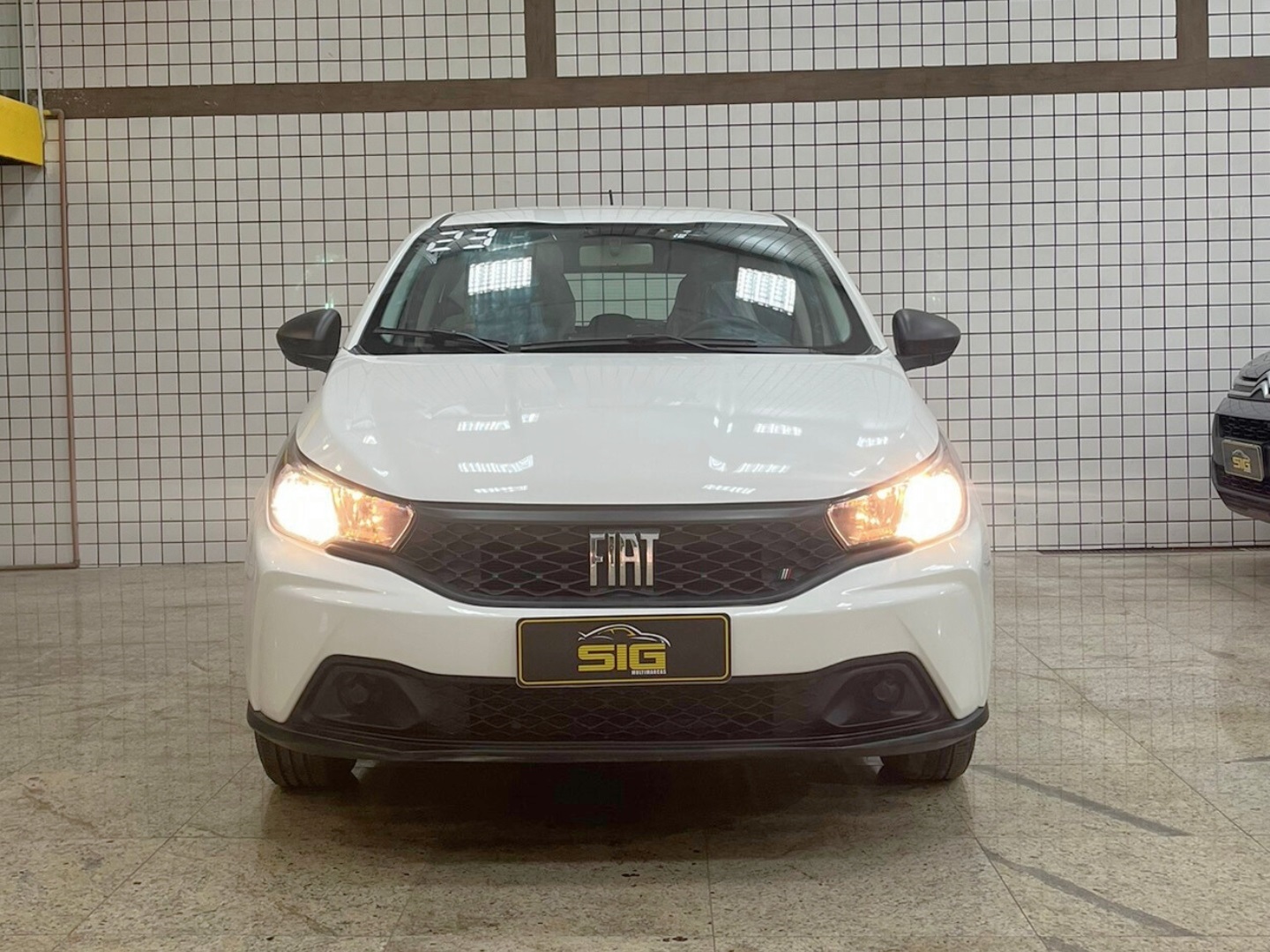 FIAT ARGO 1.0 FIREFLY FLEX MANUAL 2023 Branco seminovo à venda em Duque de Caxias - Miniatura Lateral - SIG Multimarcas