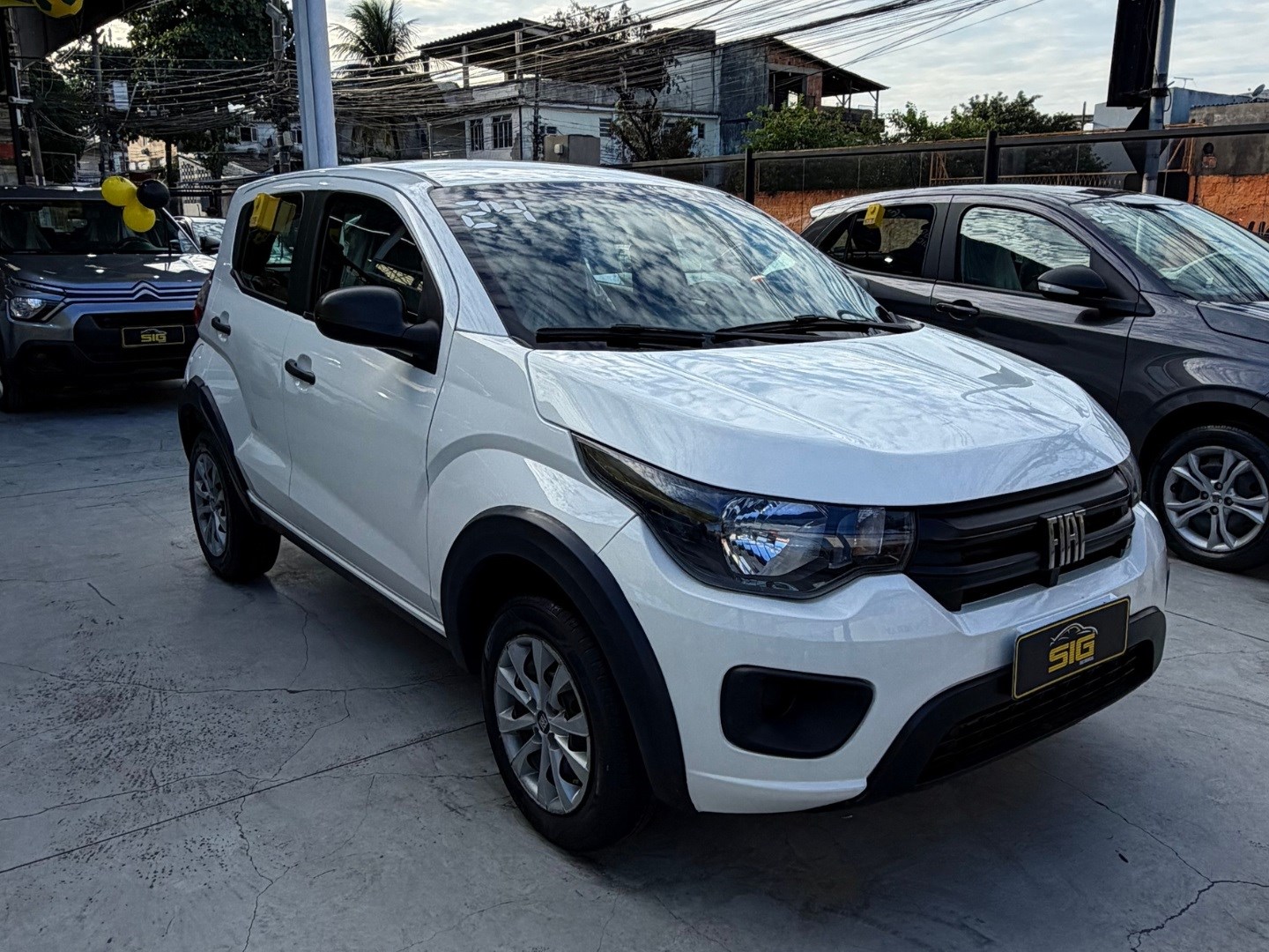 FIAT MOBI 1.0 EVO FLEX LIKE. MANUAL 2024 Branco seminovo à venda em Duque de Caxias - Frente - SIG Multimarcas
