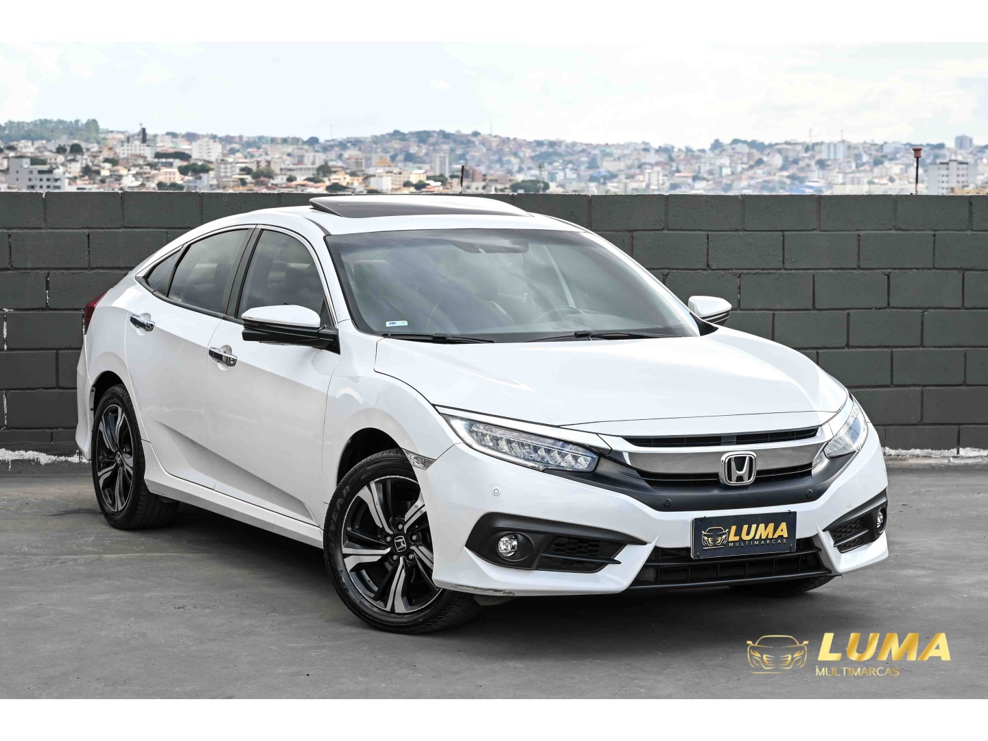 HONDA CIVIC 1.5 16V TURBO GASOLINA TOURING 4P CVT