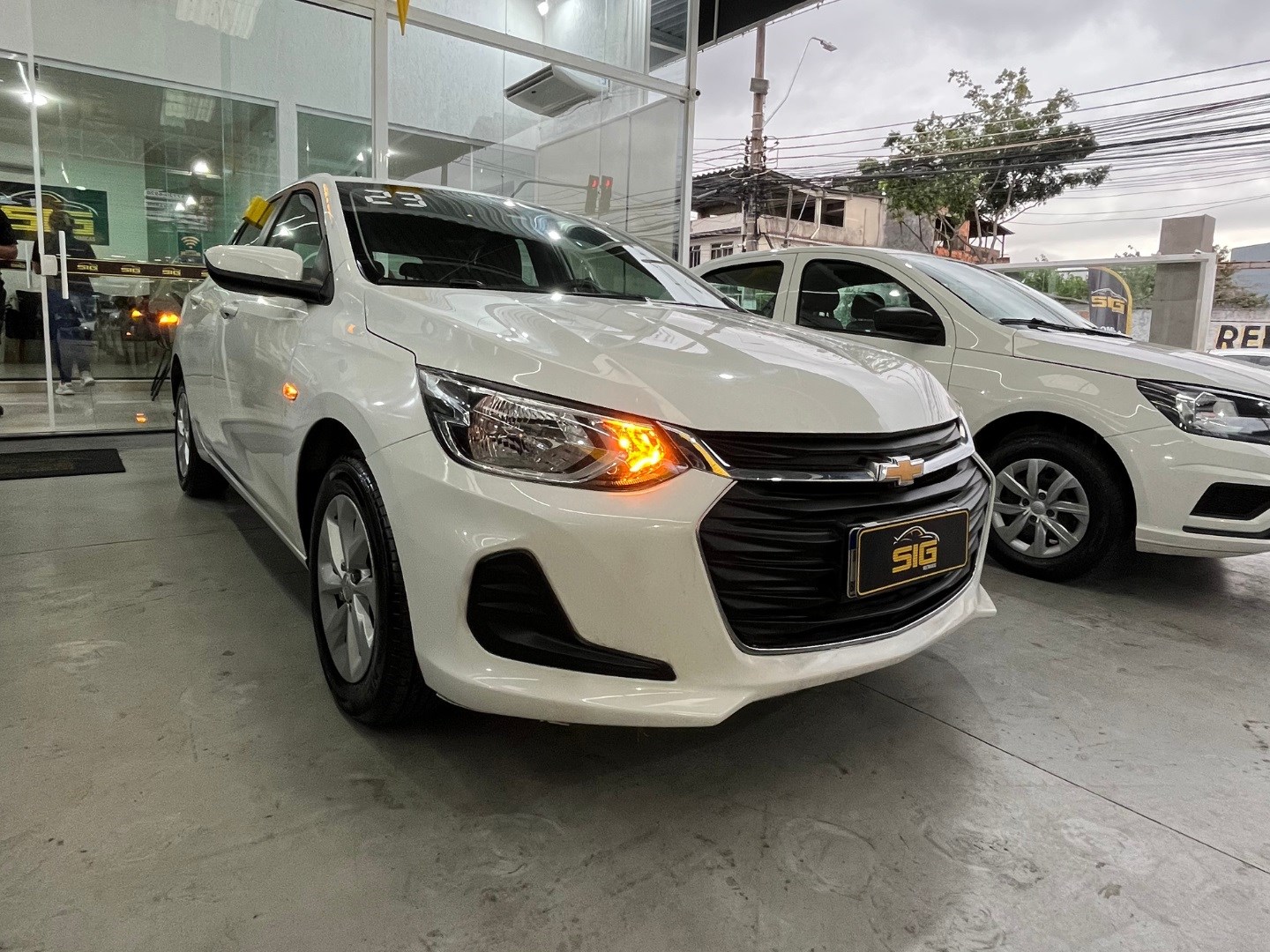 CHEVROLET ONIX 1.0 FLEX LT MANUAL 2023 na cor Branco com 59.583 km - Imagem 1 - SIG Multimarcas