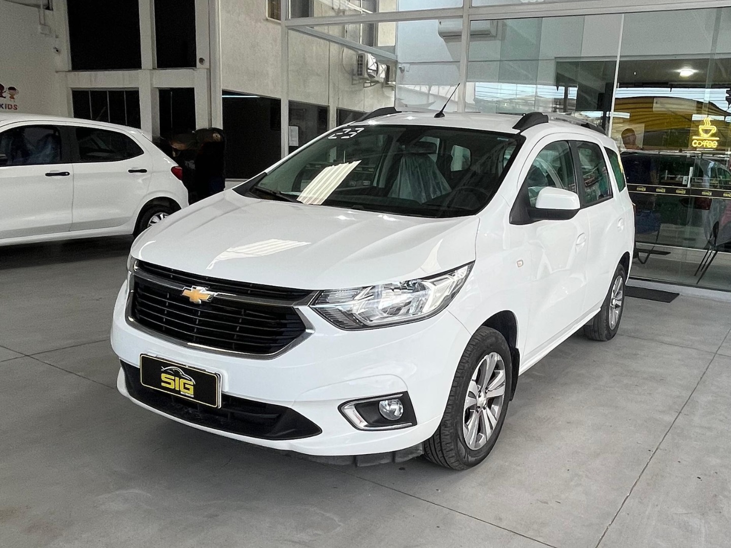 CHEVROLET SPIN PREMIER 7L 1.8 8V ECONOFLEX 4P C/AR - AUTOMÁTICO 2023 Branco - Miniatura 3 - SIG Multimarcas